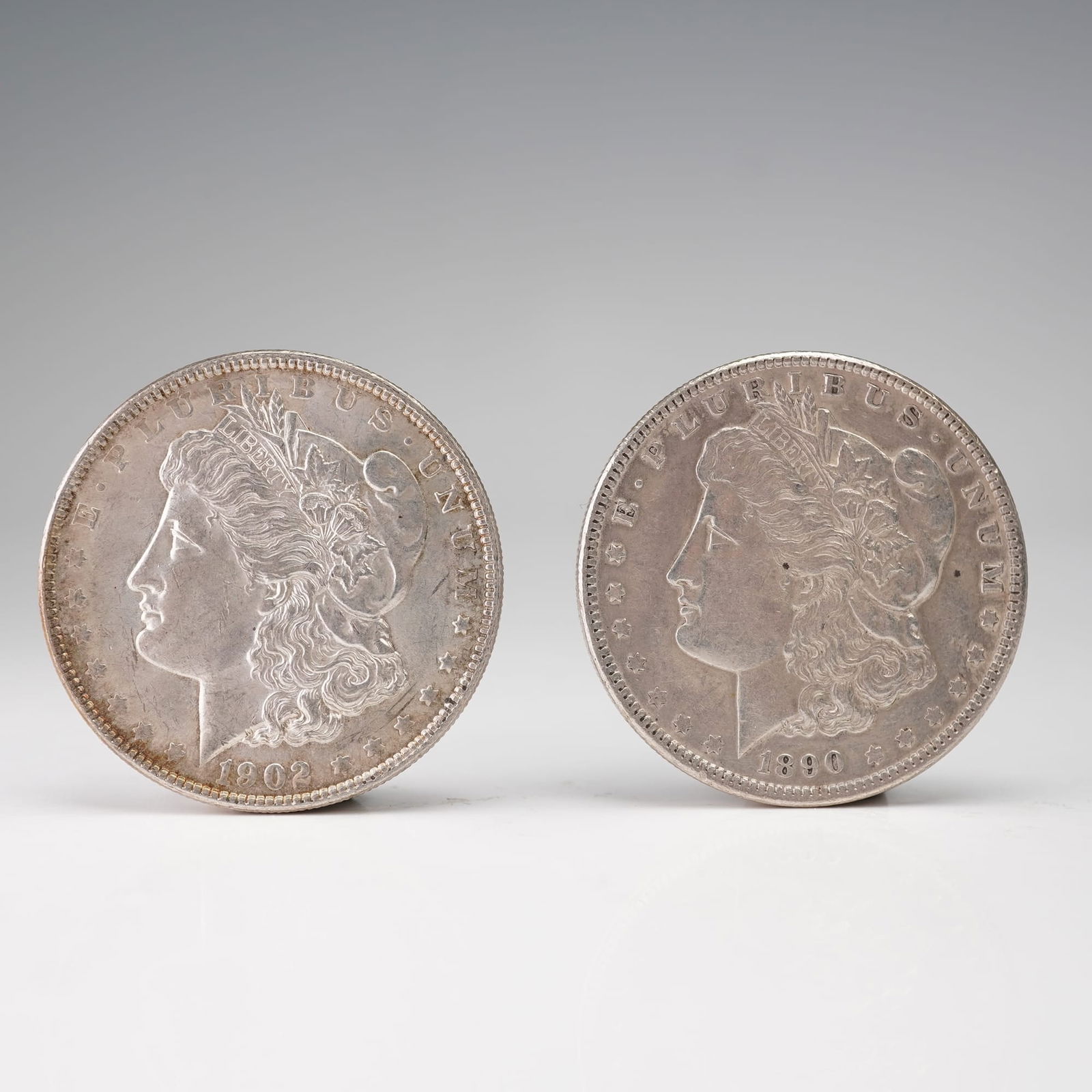 2pc 1890 and 1902 Morgan Silver Dollar Coins (1 of 2)