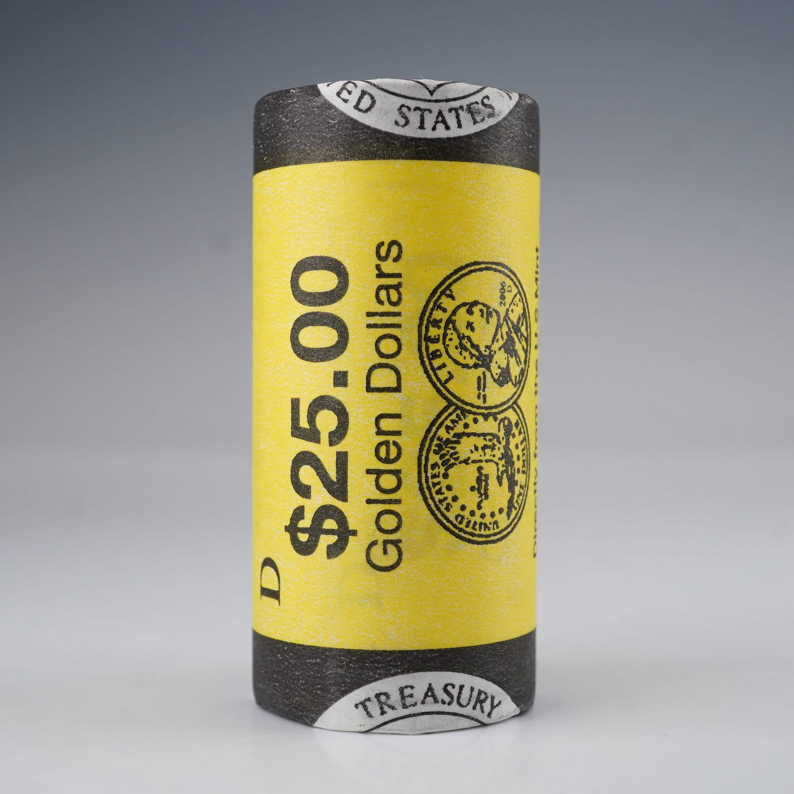 2006-D Sacagawea Golden Dollar Roll: U.S. Mint roll of 2006 Sacagawea Golden Dollars. The obverse depicts Sacagawea carrying her infant son, Jean Baptiste, with inscriptions LIBERTY and IN GOD WE TRUST. The reverse shows an eagle in flig