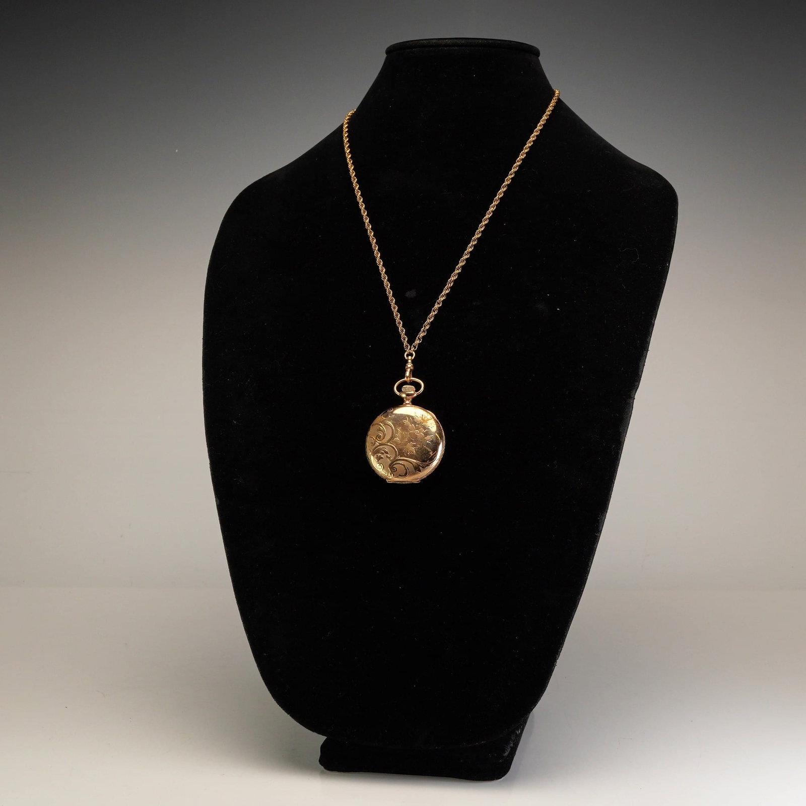 Elgin National Watch Co. Hunter-Case Pendant Watch with J. Boss Keystone Case: This Elgin National Watch Company hunter-case pocket watch pendant features a 9 karat gold-plated case manufactured by the Keystone Watch Case Co. The case is marked with the balance scale logo and is