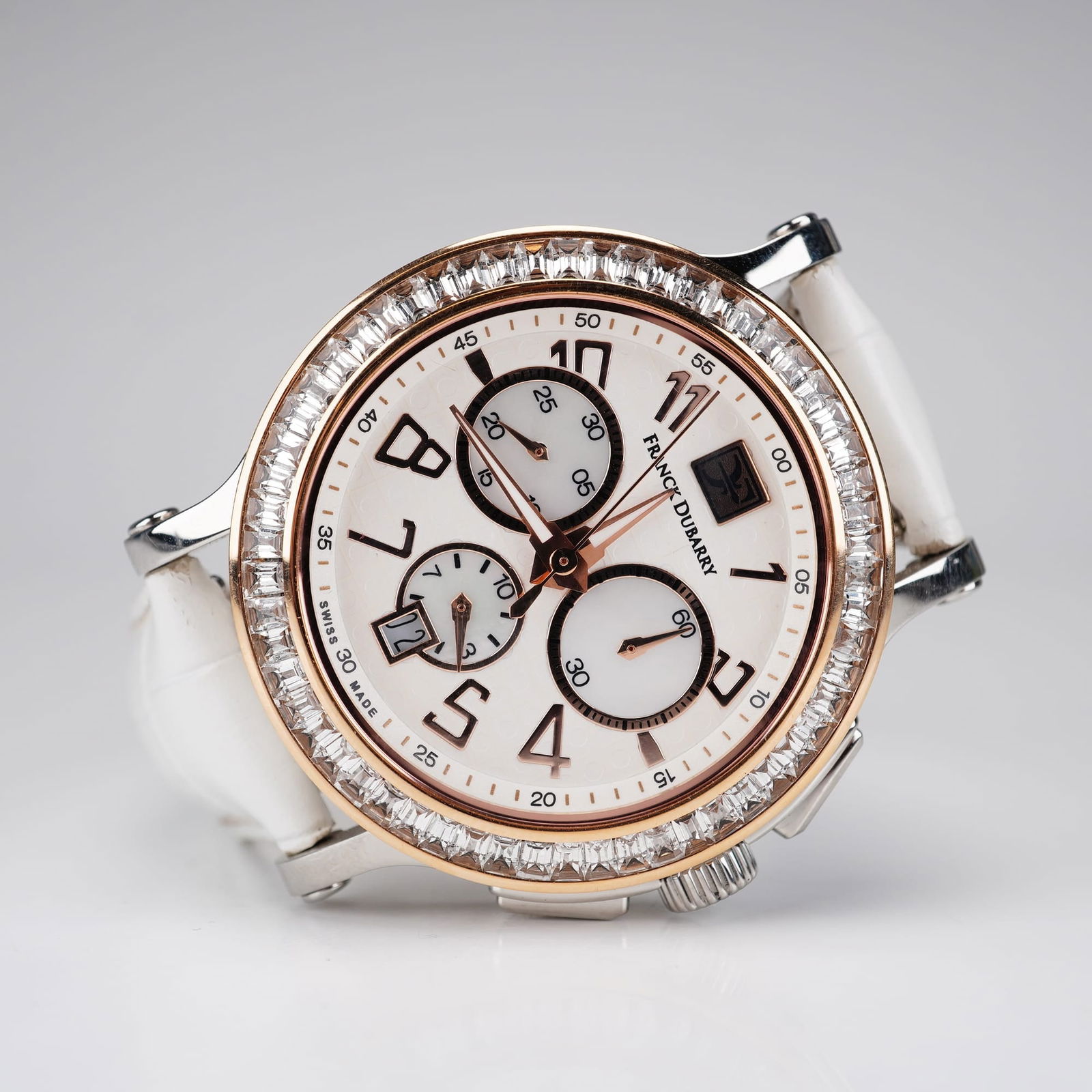 Franck Dubarry Crazy Colors Chronograph with Stone-Set Bezel: Franck Dubarry Crazy Colors collection Swiss quartz chronograph movement statement watch. The stainless steel case features a rose gold-plated bezel channel-set with baguette-cut clear stones, an irid