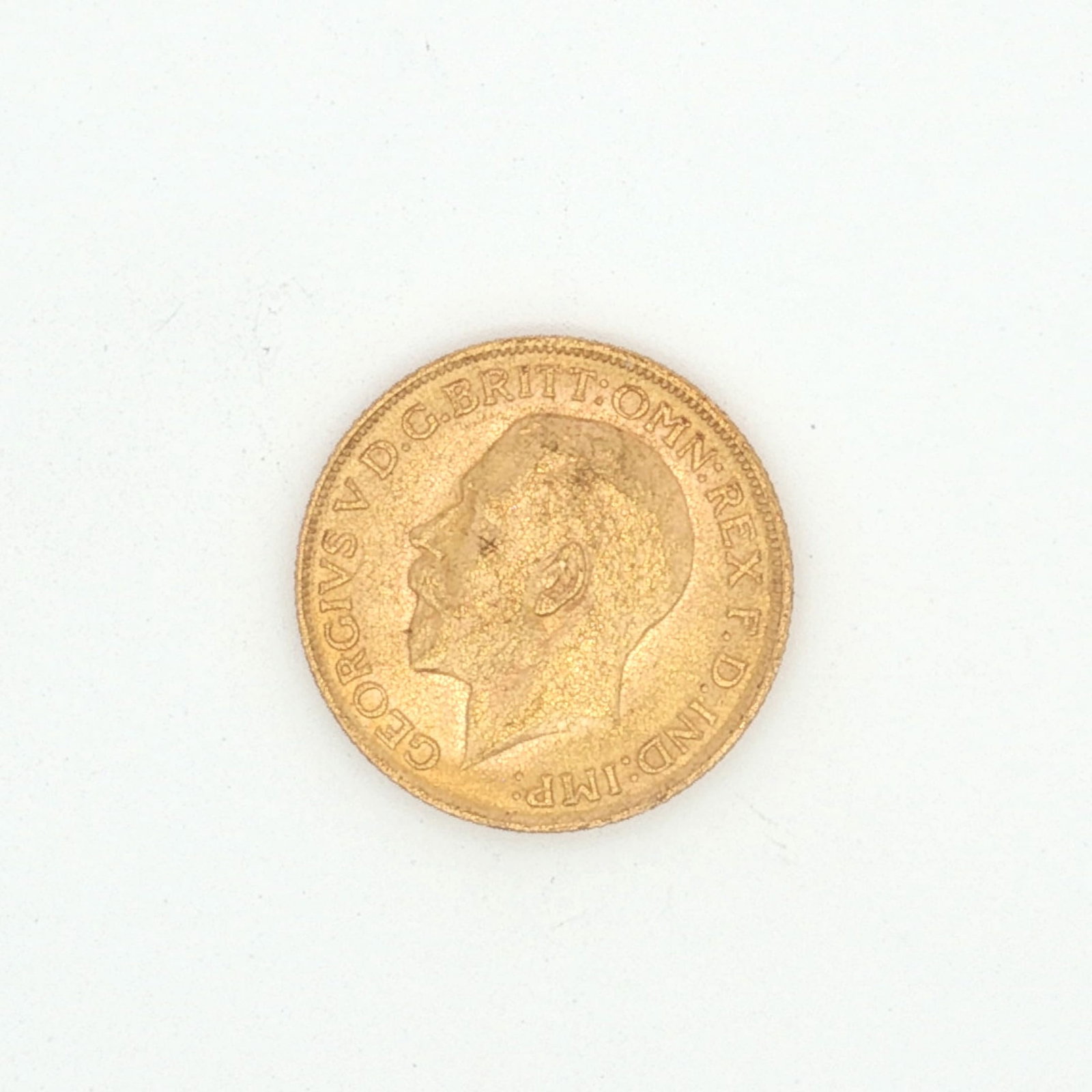 1911 UK 1 Sovereign King George V Gold Coin: Minted by the Royal Mint. The obverse side depicts the uncrowned portrait of King George V facing left, legend around. The reverse side depicts St. George on horseback slaying the dragon right. Gold c