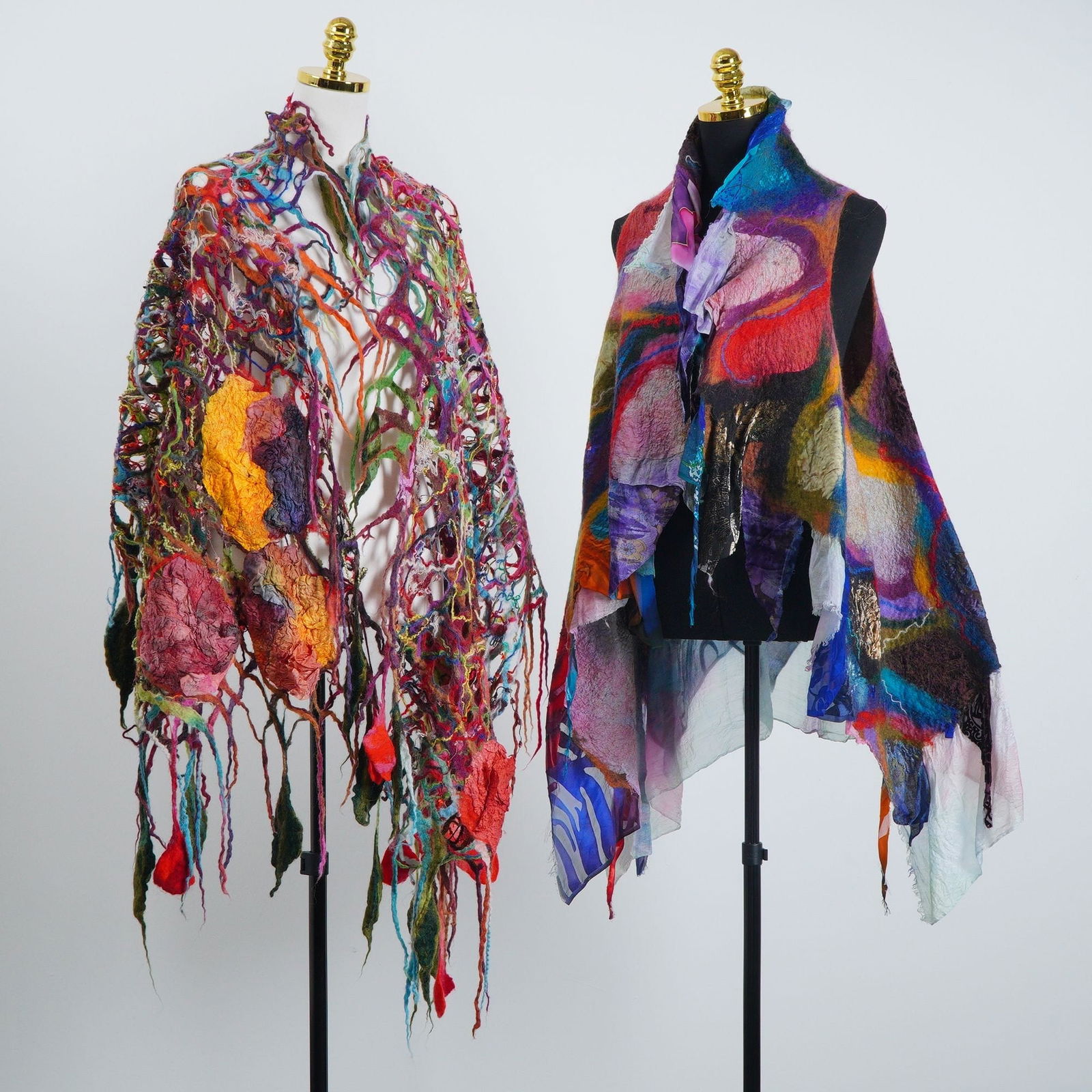 2pc Galina Kostanda and Artisanal Mixed Textile Scarf & Sleeveless Coat: This two-piece collection consists of one Galina Kostanda sleeveless coat and one artisanal mixed textile scarf. The sleeveless coat is crafted from felted wool and batik-dyed silk in mixed colors, fe