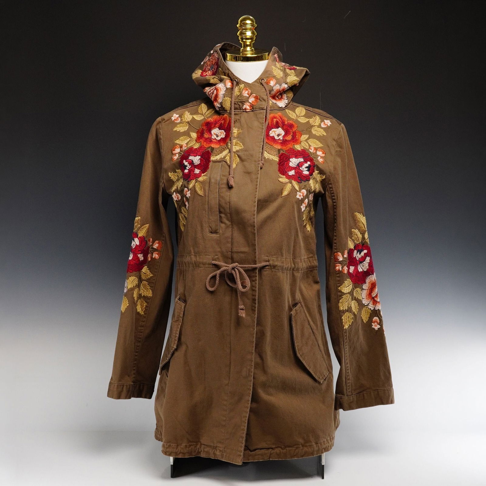 Contemporary Johnny Was Workshop Embroidered Military Parka Jacket, Size S: This contemporary designer utility coat by Johnny Was Workshop features a 1970s-inspired bohemian military aesthetic. Constructed from a heavyweight tobacco-brown cotton twill, the parka is designed w