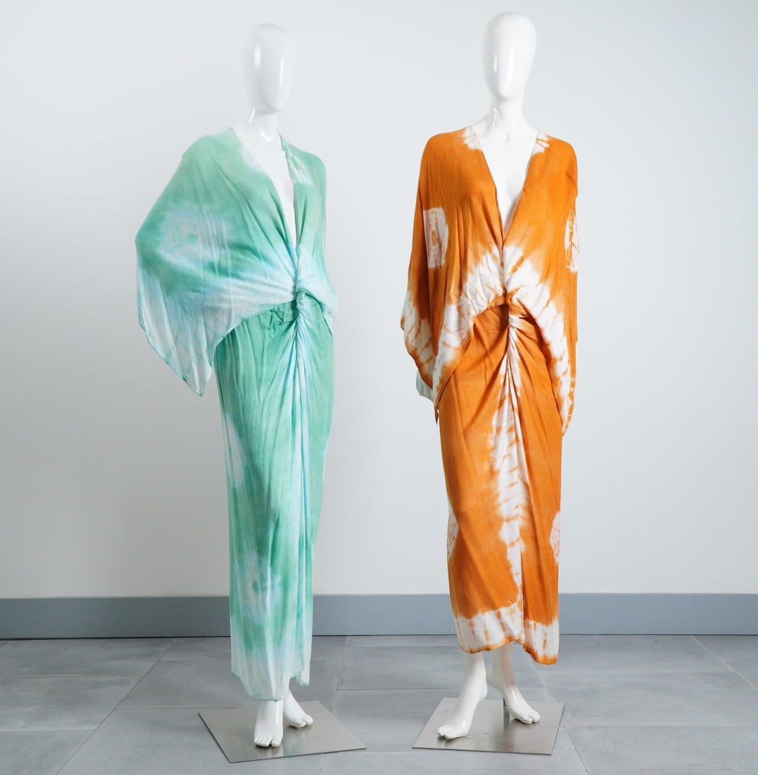 2pc Free People Spellbound Tie Dye Kimonos: A duo of Free People Spellbound tie-dyed kimonos in orange and teal. Each maxi-length dress features a plunging V-neckline with a front-knot twist detail at the waist and oversized, draped kimono-styl