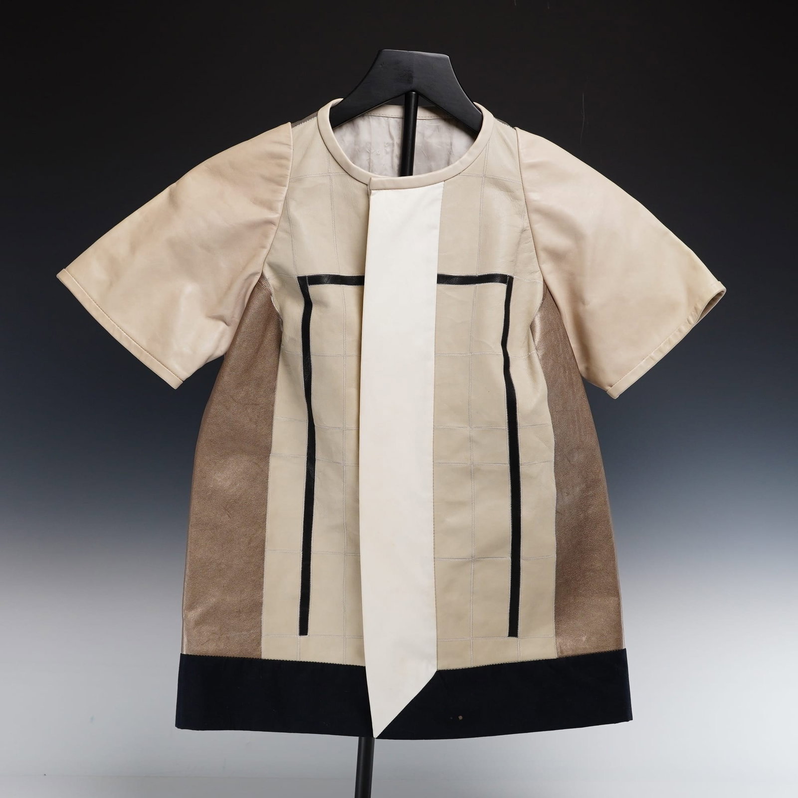 Rick Owens Nasca Paneled Leather Shirt, Spring/Summer 2012: This architectural Rick Owens Nasca leather shirt is a standout piece from the Spring/Summer 2012 collection. Crafted with the designer's signature avant-garde construction, the tunic features a compl