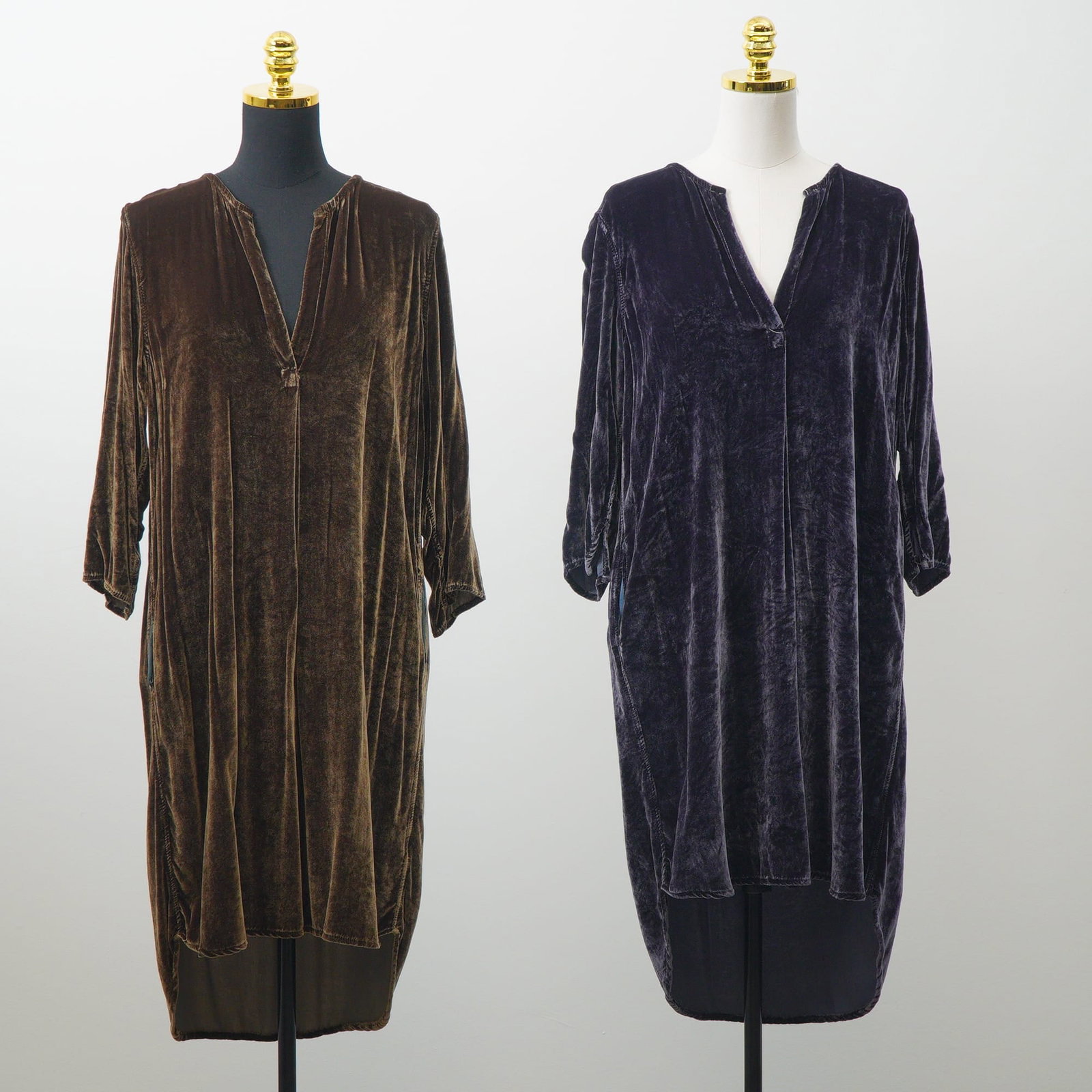 2pc CP Shades Velvet Tunic Shirt Dresses in Lava and Algae: This lot features two oversized tunic-style dresses crafted from a lustrous velvet designed by CP Shades in Lava (chocolate brown) and Algae (dark charcoal/navy). Each garment is designed with a deep