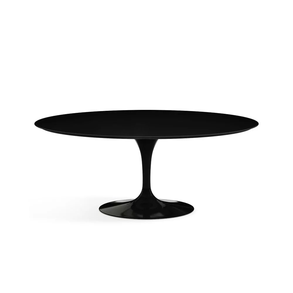 Knoll Saarinen Collection Oval Dining Table with Black Laminate Top and Black Frame: This Knoll Saarinen Collection oval dining table features a black laminate top and a black frame. The design is part of the Pedestal Collection by Eero Saarinen and consists of a single oval top with