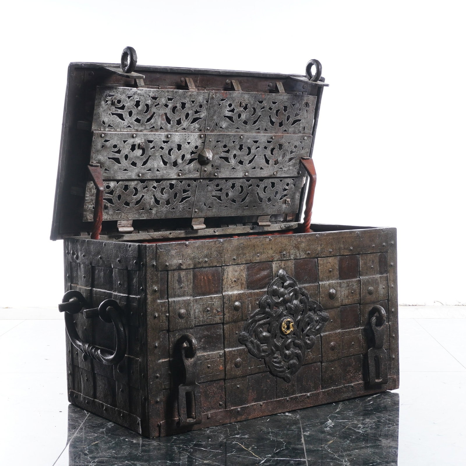 17th Century Iron & Wood Armada Sea Chest: This large 17th-century Armada Sea chest, also called a treasure chest, is a heavy-duty, hand-forged iron strongbox from Germany. It is made of iron-banded wood and, designed for security, features a