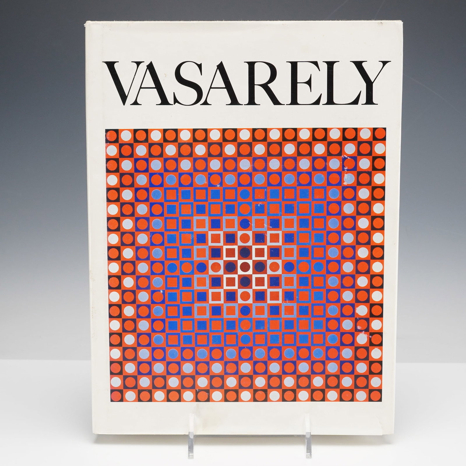 Victor Vasarely Hardcover Book, Vasarely: New York: Alpine Fine Arts Collection: 1979. Illustrated throughout with vibrant reproductions of Vasarely's geometric compositions, the volume reflects his pioneering exploration of optical illusion