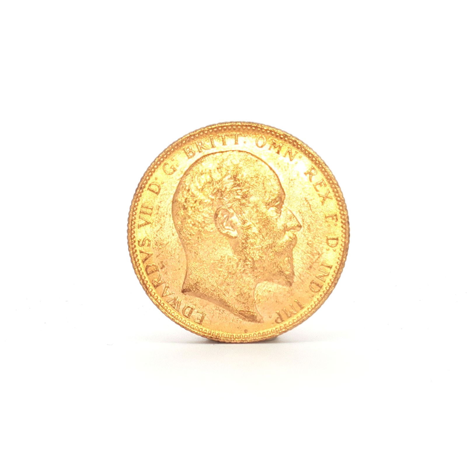 1905 UK 1 Sovereign King Edward VII Gold Coin: 1905 British 1 Sovereign gold coin issued by the Royal Mint. The obverse bears a right-facing portrait of King Edward VII without crown, surrounded by legend. The reverse features St. George on horseb
