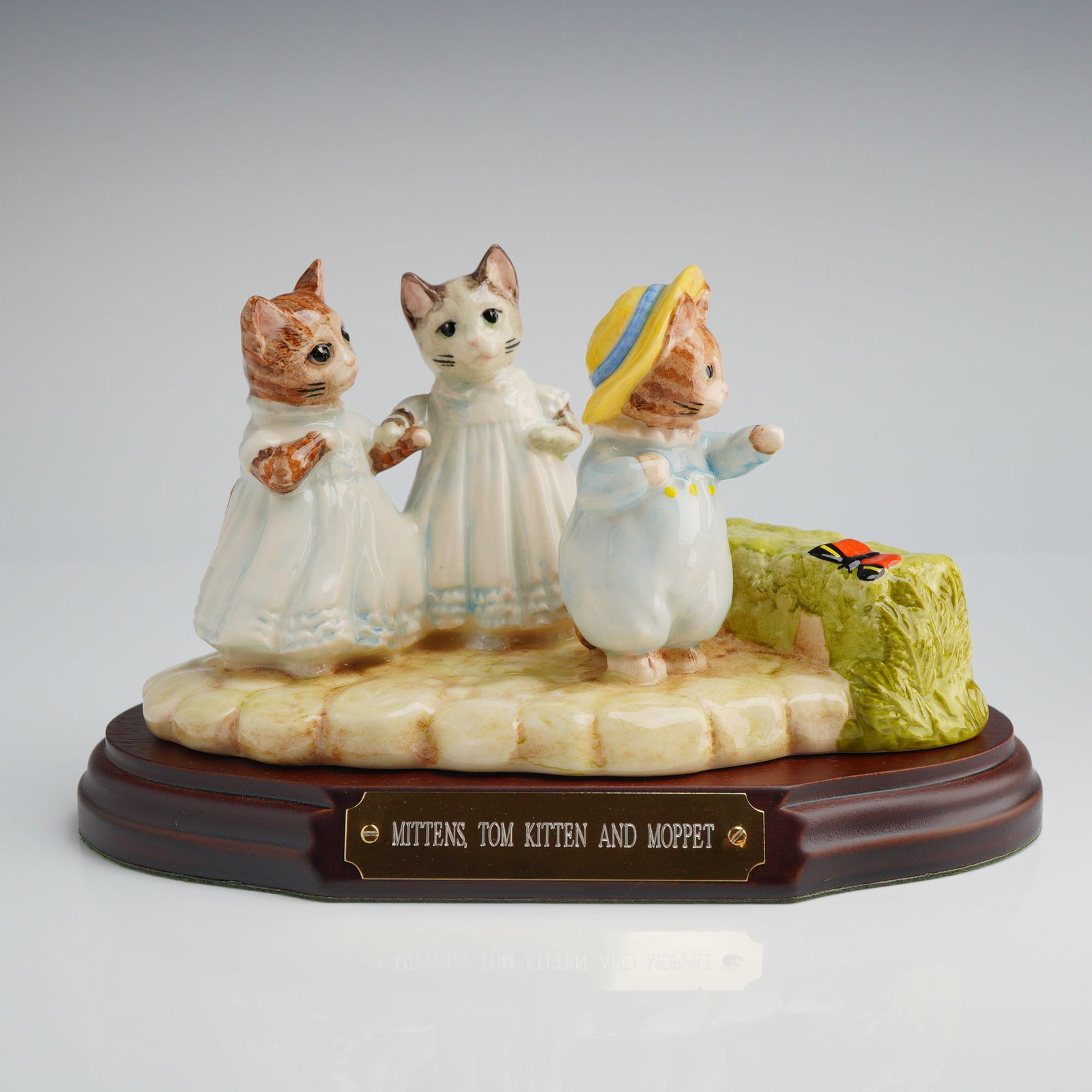 Beswick Beatrix Potter 1999 Annual Collectors Tableau Set: A single glazed ceramic figurine tableau, titled Mittens, Tom Kitten and Moppet, based on the characters created by Beatrix Potter. The polychrome-painted earthenware group features three anthropomorp