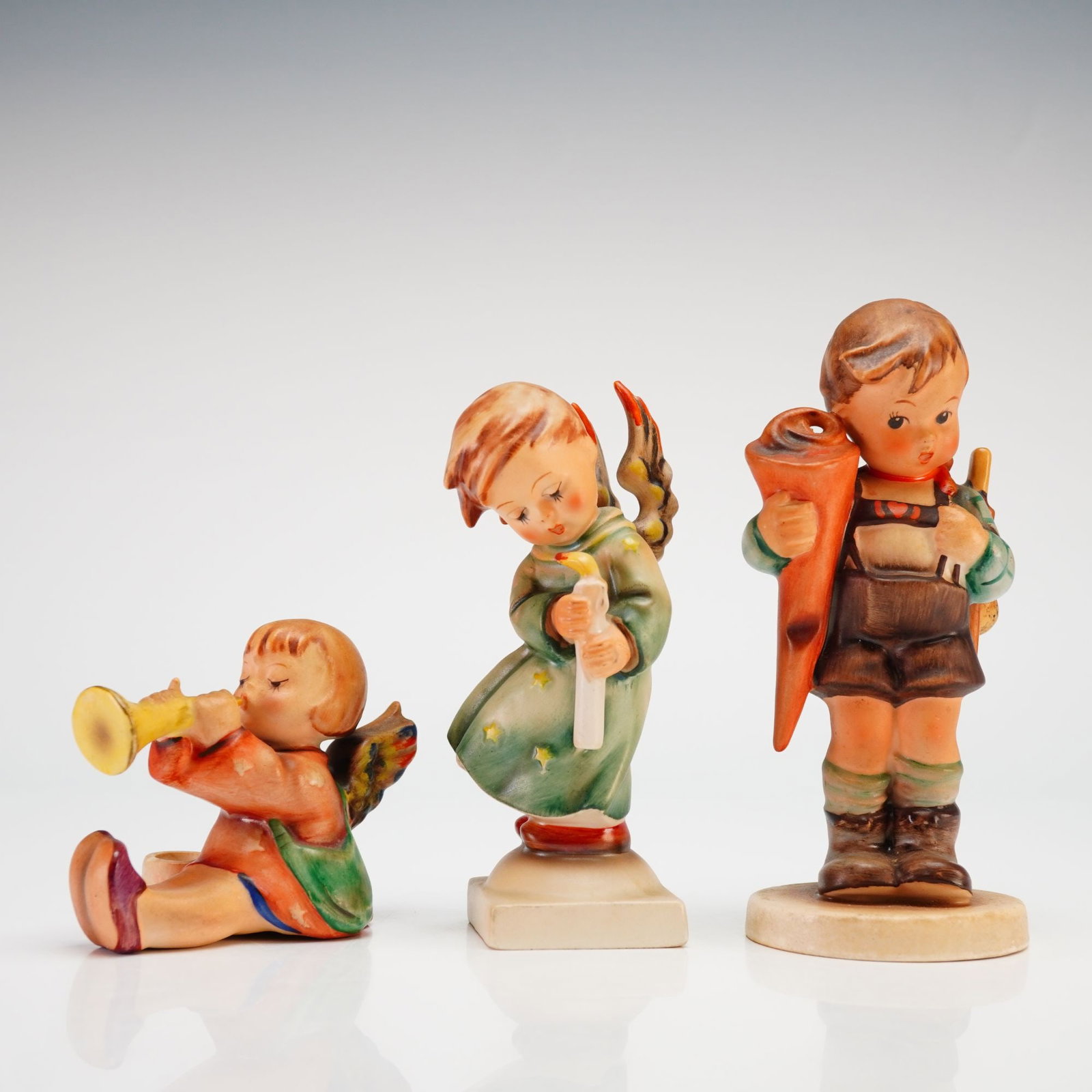 Three Hummel Goebel Figurines Including Joyous News Little Scholar and Heavenly Angel (1 of 3)