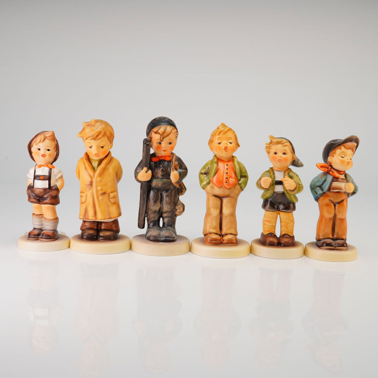 A Set of Six Goebel and M.I. Hummel Club Ceramic Figurines (1 of 3)
