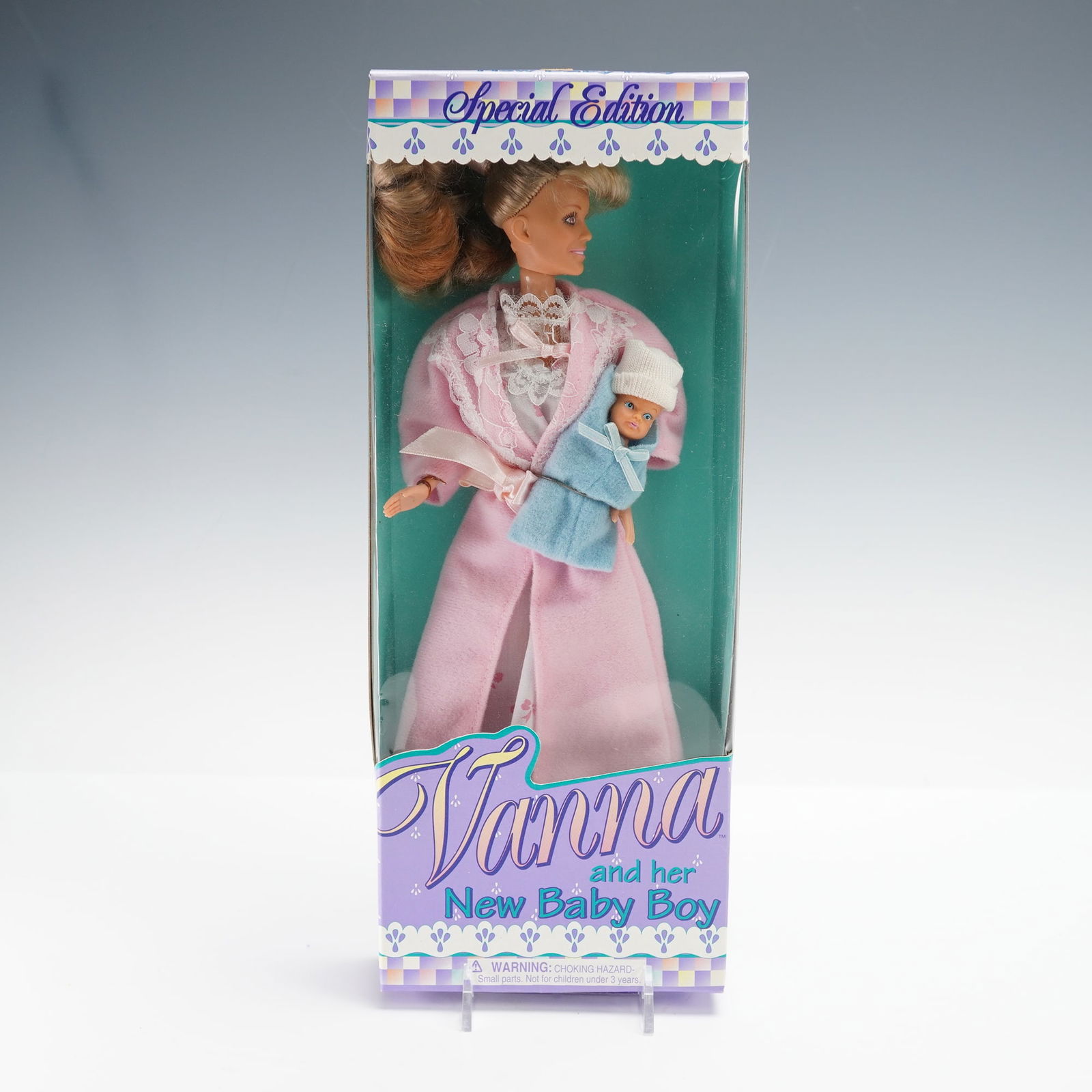 Vanna and Her New Baby Boy Doll Special Edition: This special edition doll set from Totsy features Vanna and her newborn baby boy Nicholas John born on June 10th 1984. The doll comes dressed in a pink robe and holds the baby wrapped in a blue blanke