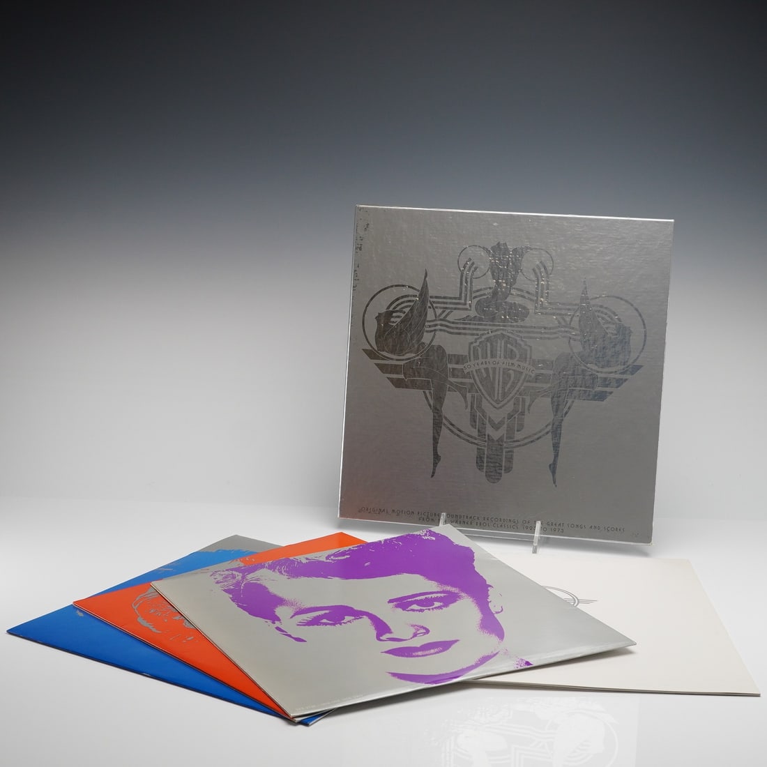 50 Years of Film Music 3 LP Set: Various Artists. 50 Years of Film Music: Warner Bros. Presents. Original Motion Picture Soundtrack Recordings of Great Songs and Scores 1923-1973. Burbank, CA: Warner Bros. Records, 1973. A Capitol Re