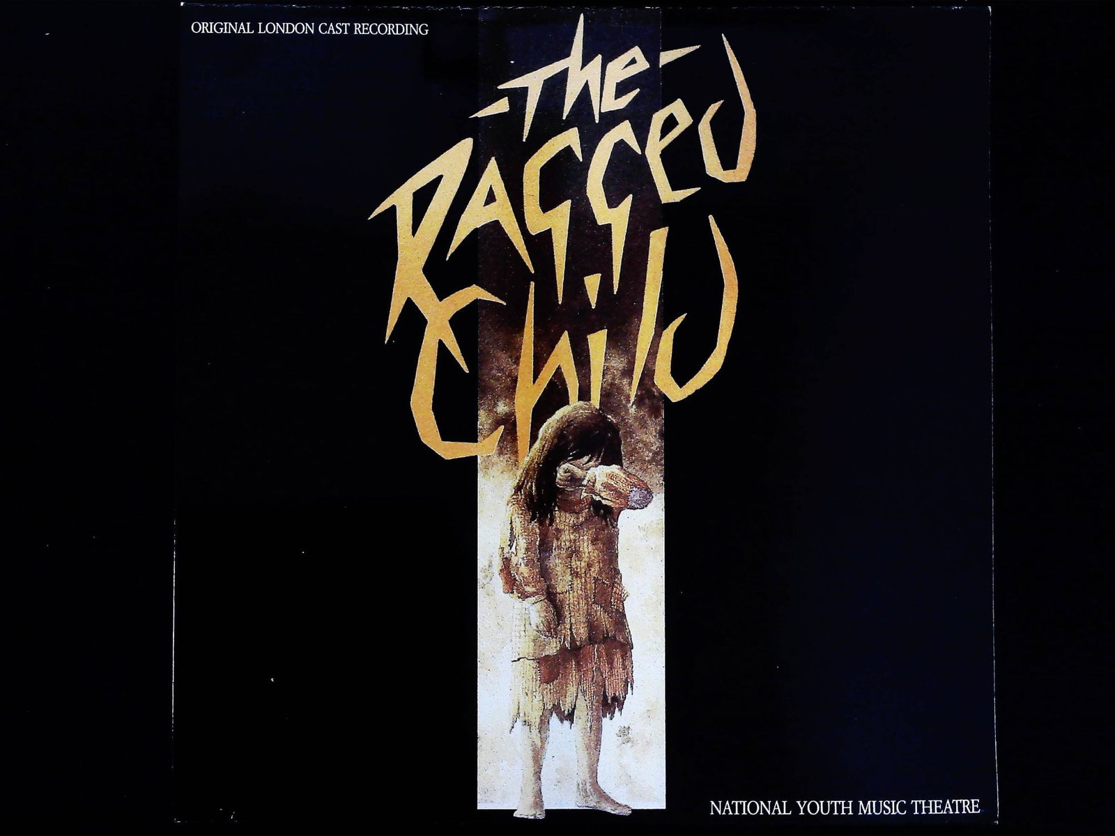 The Ragged Child Original London Cast Recording LP: A vintage 12-inch vinyl LP record featuring the Original London Cast Recording of the musical The Ragged Child, performed by the National Youth Music Theatre. The recording was released by First Night