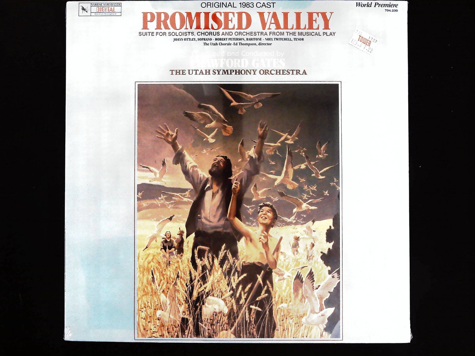 Promised Valley Original Cast Recording LP 1983: This is a single vinyl record album (LP) featuring the original 1983 cast recording of Promised Valley, identified as a "Suite for Soloists, Chorus and Orchestra from the Musical Play." The performanc