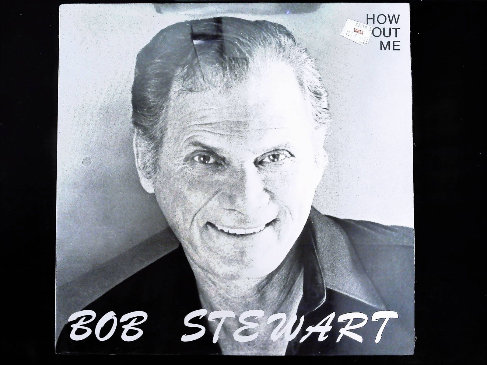Bob Stewart How About Me Private Press LP: A single cardboard album for the private press LP Bob Stewart How About Me. The front cover features a black-and-white photographic portrait of the artist with his name displayed in large white script
