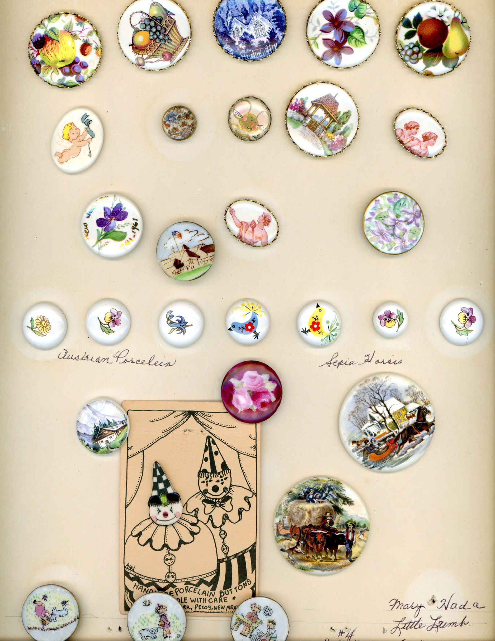 A CARD OF DIVISION THREE STUDIO ARTIST BUTTONS: 28 S/M/L 20th century porcelain ceramic examples. DimensionsSM=Less than 3/4", Medium=3/4" to 1 1/4". Large=1 1/4" and above, extra large=1 3/4" and above Date or EraDIVISION 1=PRE 1918 AND DIVISION 3