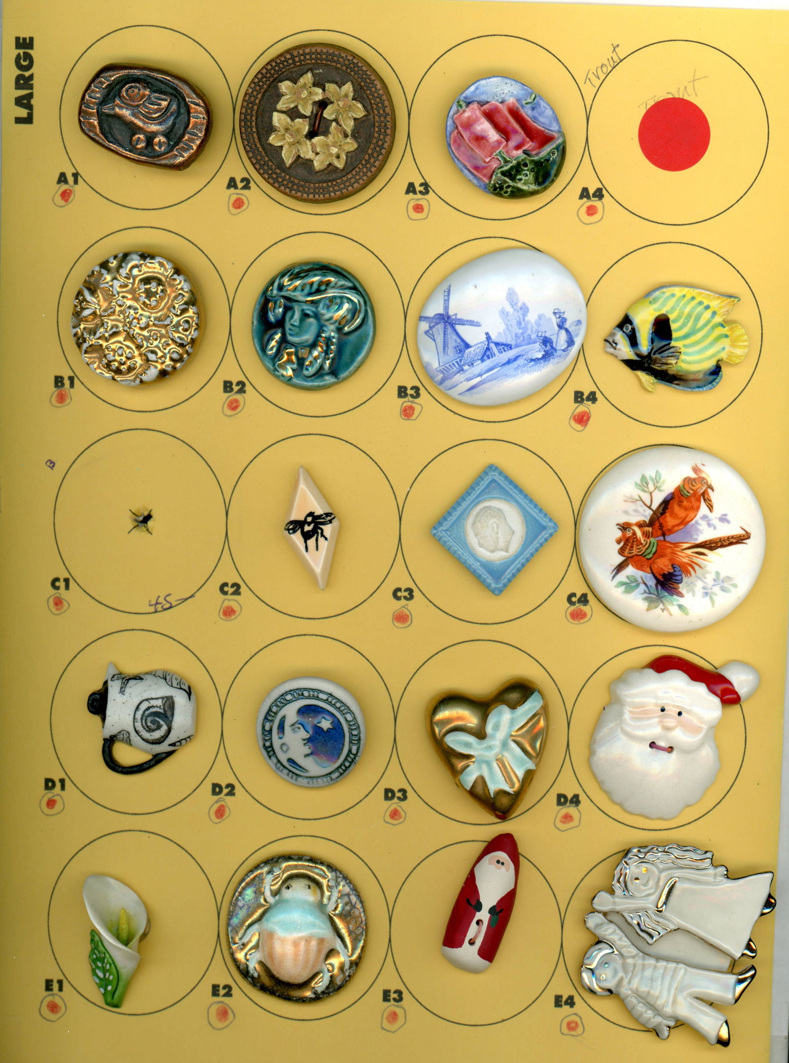 A CARD OF DIVISION THREE CERAMIC BUTTONS: 18 Large 20th century examples including realistic shapes. DimensionsSM=Less than 3/4", Medium=3/4" to 1 1/4". Large=1 1/4" and above, extra large=1 3/4" and above Date or EraDIVISION 1=PRE 1918 AND D
