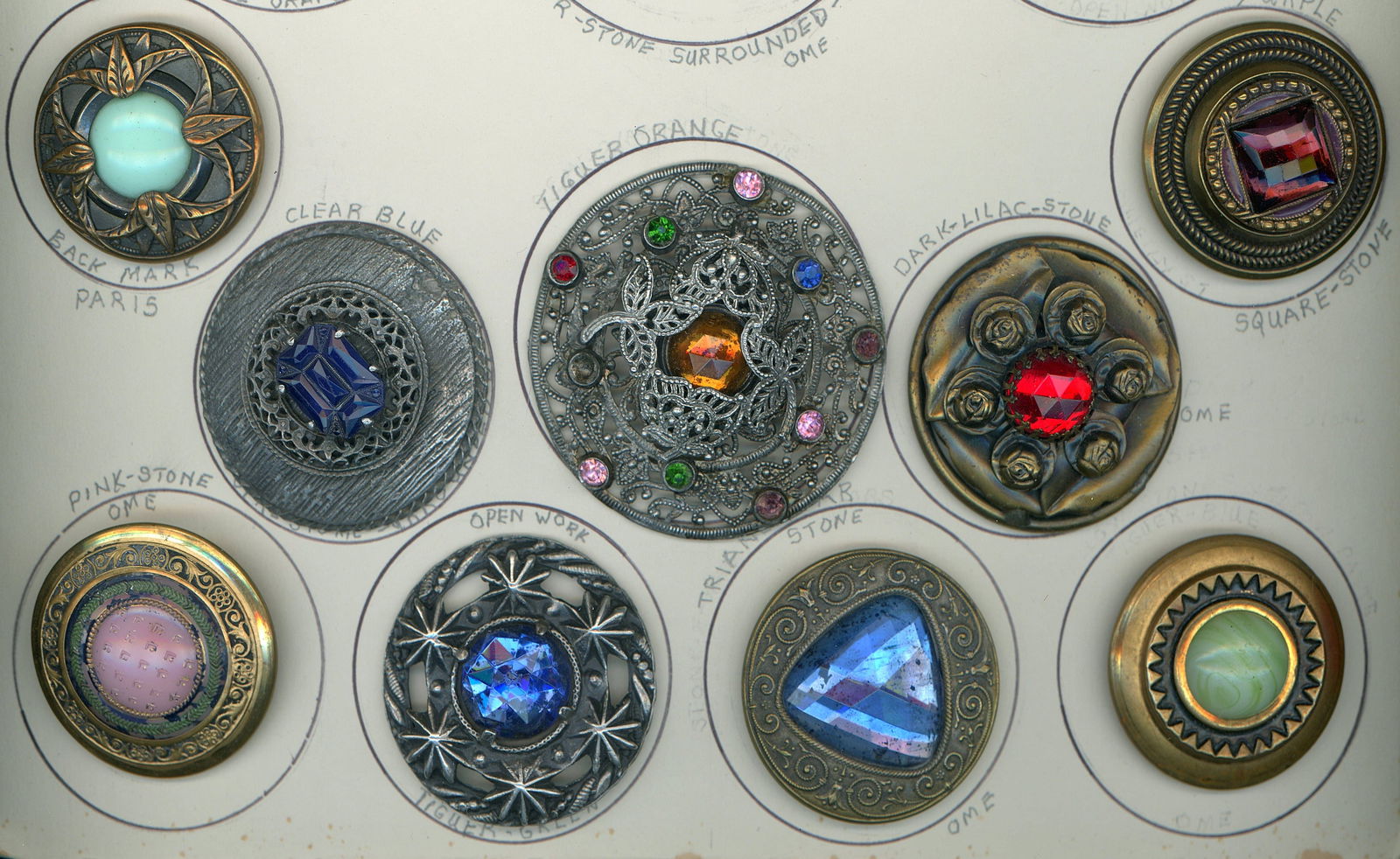 A PARTIAL CARD OF DIVISION ONE LARGE JEWEL BUTTONS: 9 Large/Ex. Large late 19th early 20th century examples. DimensionsSM=Less than 3/4", Medium=3/4" to 1 1/4". Large=1 1/4" and above, extra large=1 3/4" and above Date or EraDIVISION 1=PRE 1918 AND DIV