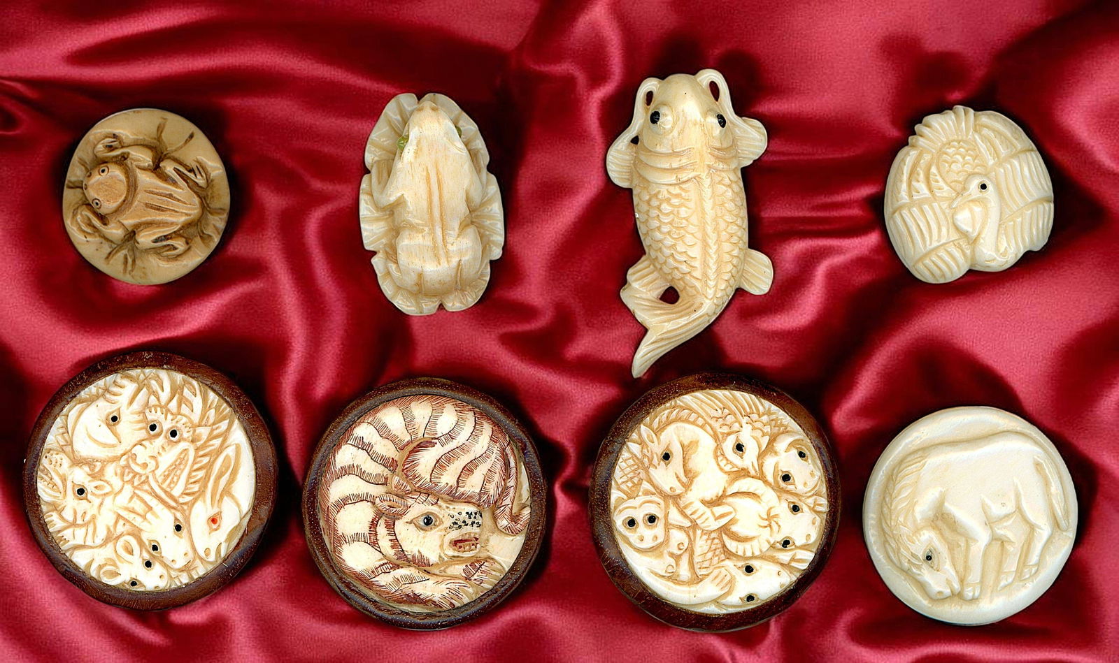 A SMALL CARD OF DIVISION THREE PICTORIAL BUTTONS: 8 Medium/Large 20th/21st C. carved natural material examples. DimensionsSM=Less than 3/4", Medium=3/4" to 1 1/4". Large=1 1/4" and above, extra large=1 3/4" and above Date or EraDIVISION 1=PRE 1918 AN