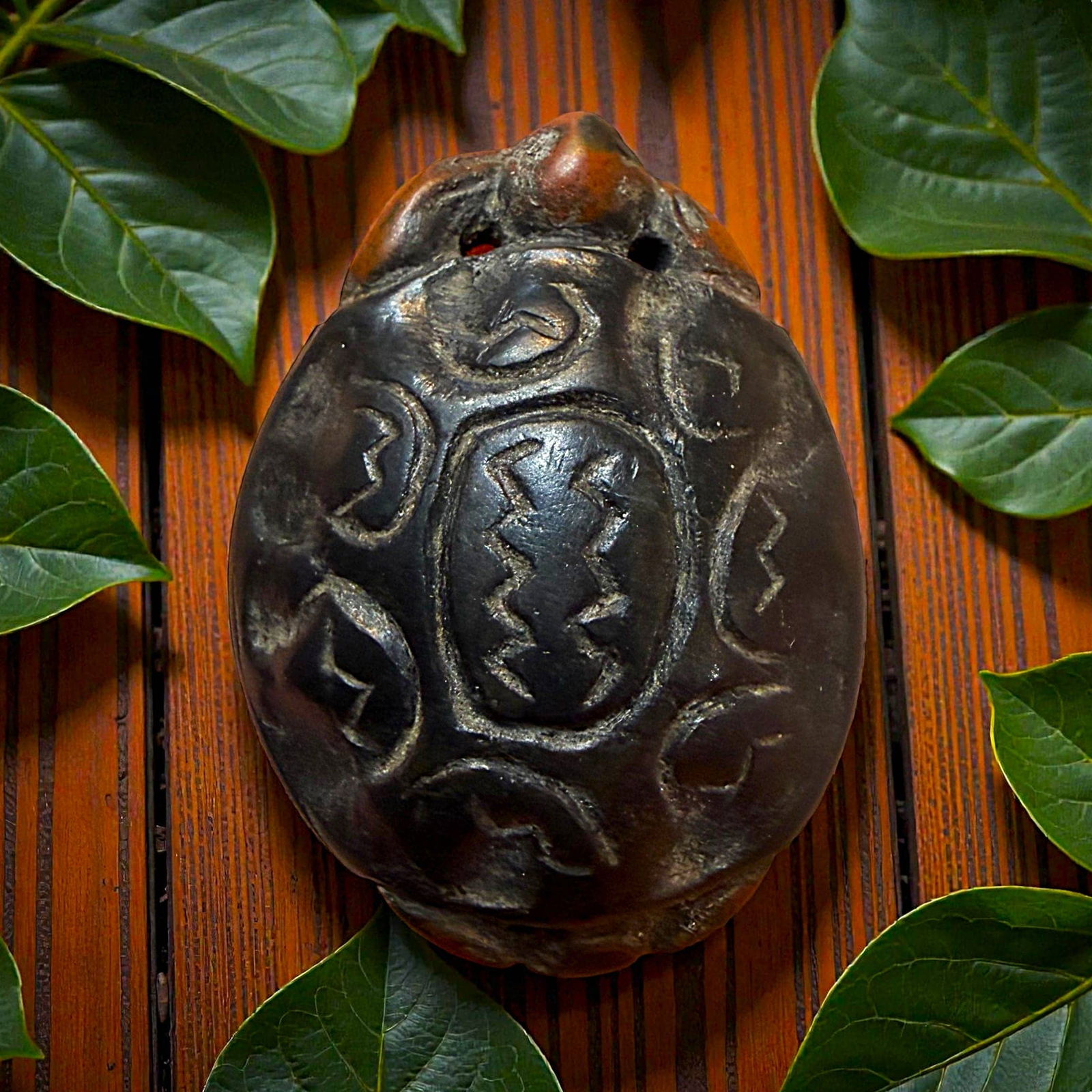 AN UNUSUAL DIVISION THREE TURTLE BUTTON - 2