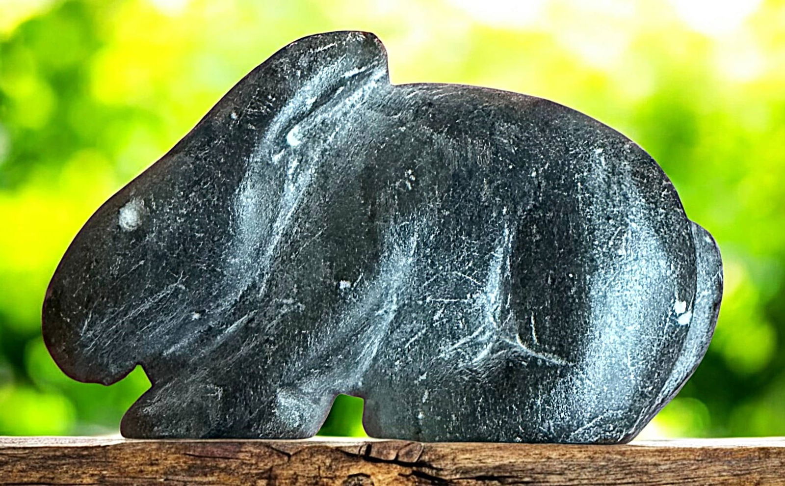 A DIVISION THREE REALISTIC ANIMAL BUTTON: 1 Large 20th century thick hardstone rabbit example. DimensionsSM=Less than 3/4", Medium=3/4" to 1 1/4". Large=1 1/4" and above, extra large=1 3/4" and above Date or EraDIVISION 1=PRE 1918 AND DIVISIO