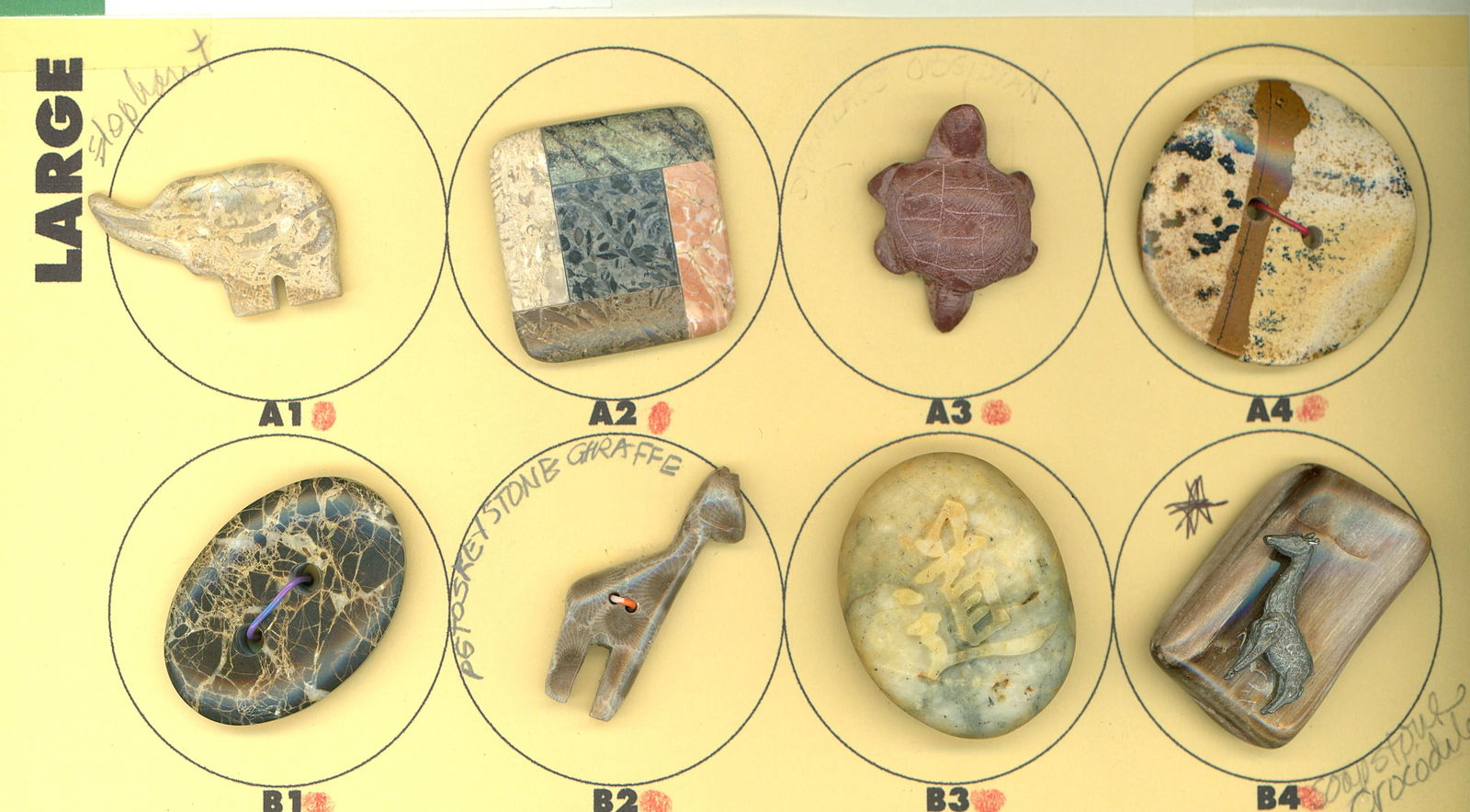 A SMALL CARD OF DIVISION THREE STONE BUTTONS: 8 Large 20th century hardstone examples including pictorial. DimensionsSM=Less than 3/4", Medium=3/4" to 1 1/4". Large=1 1/4" and above, extra large=1 3/4" and above Date or EraDIVISION 1=PRE 1918