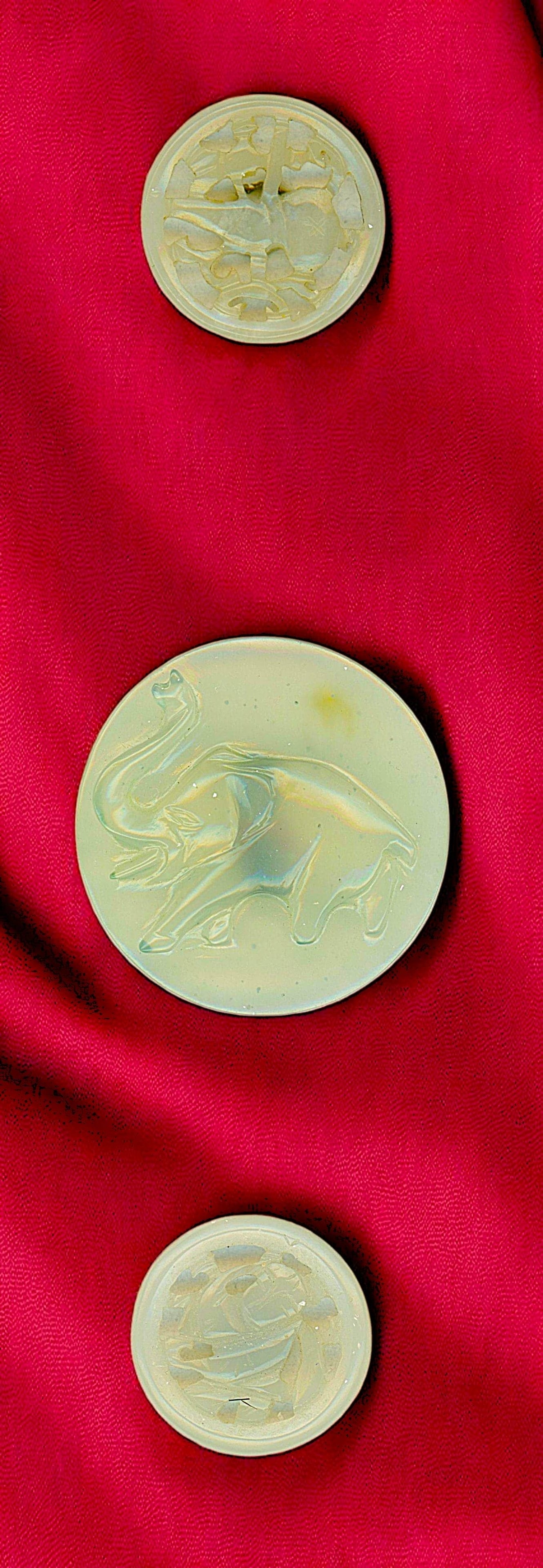 A SMALL CARD OF DIVISION ONE AND THREE GEMSTONE BUTTONS: 3 Medium/Large-Med. 19th/20th C. carved and or pierced examples. DimensionsSM=Less than 3/4", Medium=3/4" to 1 1/4". Large=1 1/4" and above, extra large=1 3/4" and above Date or EraDIVISION 1=PRE