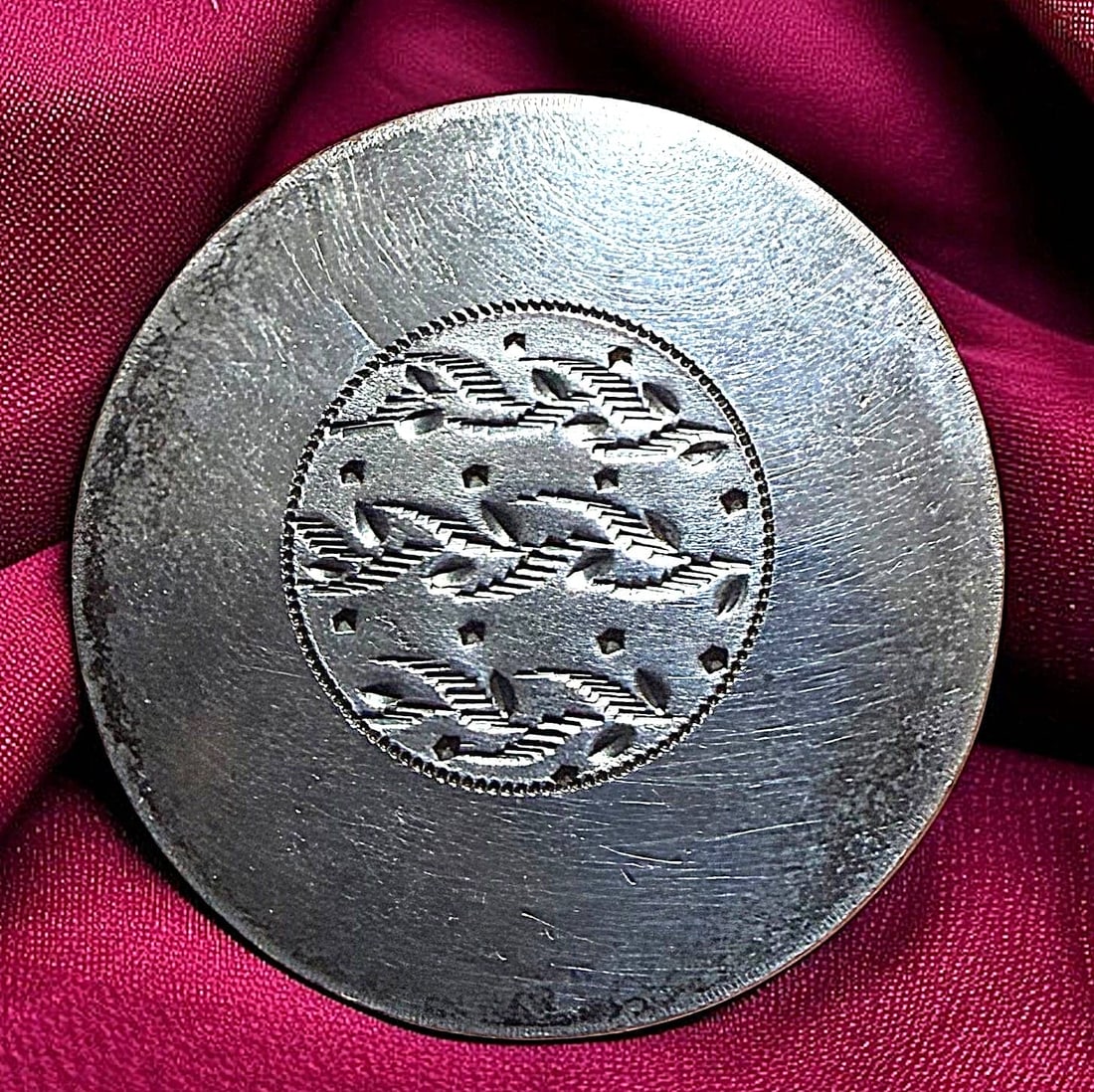 A DIVISION ONE HAND TOOLED COPPER BUTTON: 1 Large 18th century engraved copper button with a center design. DimensionsSM=Less than 3/4", Medium=3/4" to 1 1/4". Large=1 1/4" and above, extra large=1 3/4" and above Date or EraDIVISION 1=PRE 191