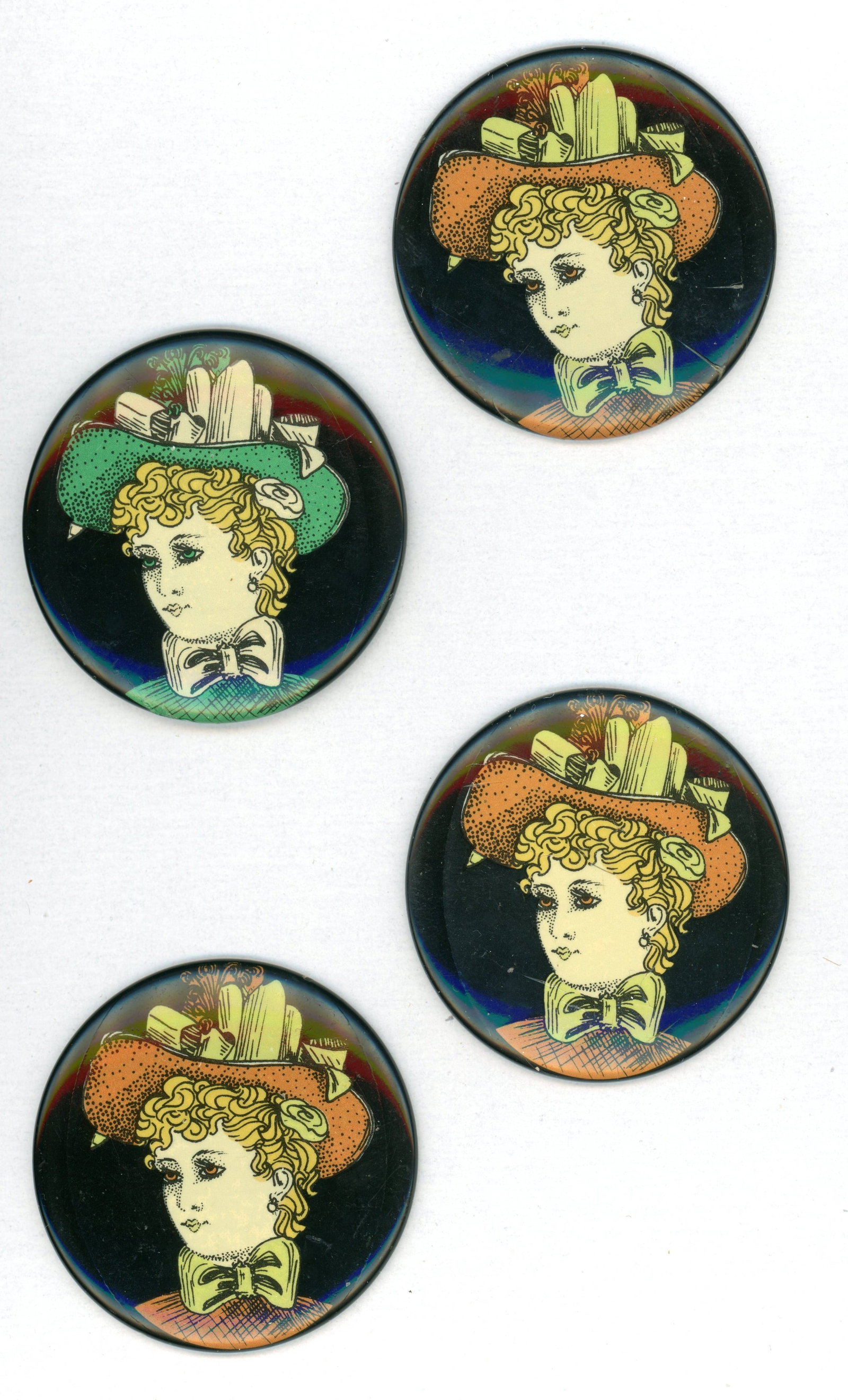 A SMALL CARD OF ALMOST MATCHING BUTTONS: 4 Extra Large 20th century colorful ladies in big hat examples. DimensionsSM=Less than 3/4", Medium=3/4" to 1 1/4". Large=1 1/4" and above, extra large=1 3/4" and above Date or EraDIVISION 1=PRE
