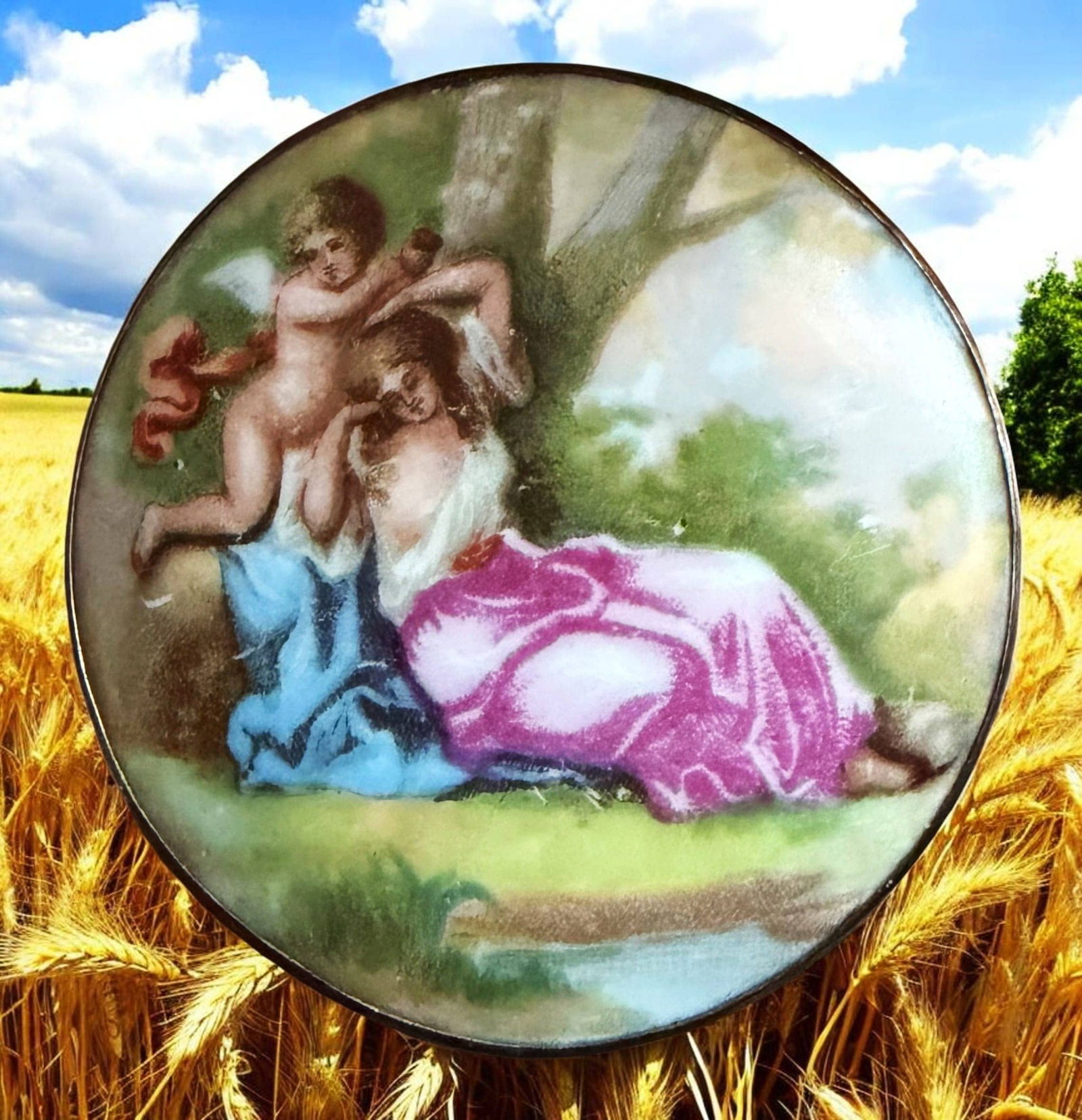 A DIVISION ONE COLORFUL PORCELAIN SCENE BUTTON: 1 Large early 20th century example of a cherub angel and women. DimensionsSM=Less than 3/4", Medium=3/4" to 1 1/4". Large=1 1/4" and above, extra large=1 3/4" and above Date or EraDIVISION 1=PRE