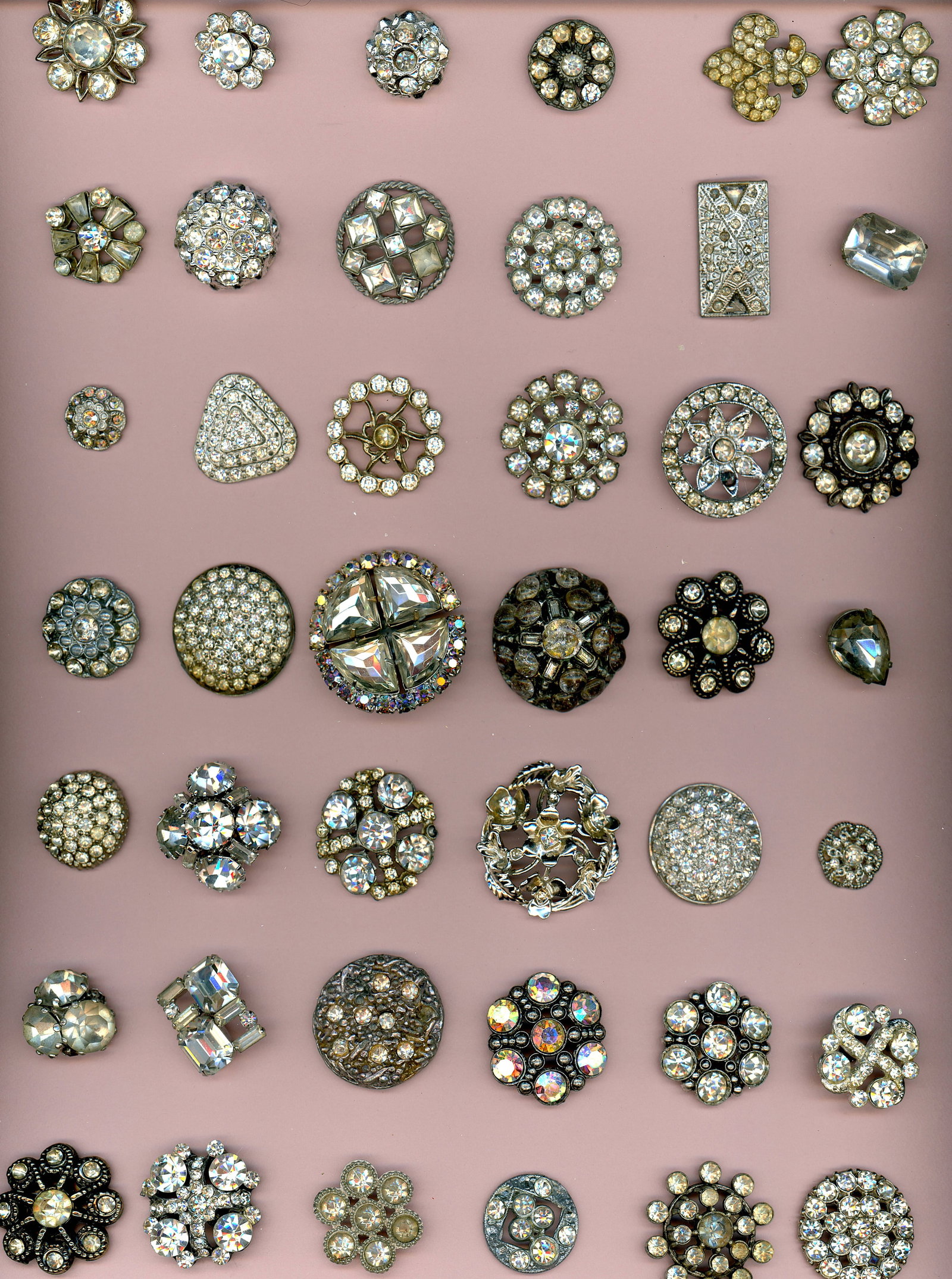 A CARD OF DIVISION ONE AND THREE "GLITZ" BUTTONS: 42 S/M/L 19th /20th century assorted "BLING" examples DimensionsSM=Less than 3/4", Medium=3/4" to 1 1/4". Large=1 1/4" and above, extra large=1 3/4" and above Date or EraDIVISION 1=PRE 1918 AND