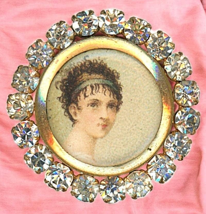 A DIVISION ONE UNDER GLASS FEMALE BUTTON: 1 Medium size 19th century painted under glass in gold example. DimensionsSM=Less than 3/4", Medium=3/4" to 1 1/4". Large=1 1/4" and above, extra large=1 3/4" and above Date or EraDIVISION 1=PRE 1918