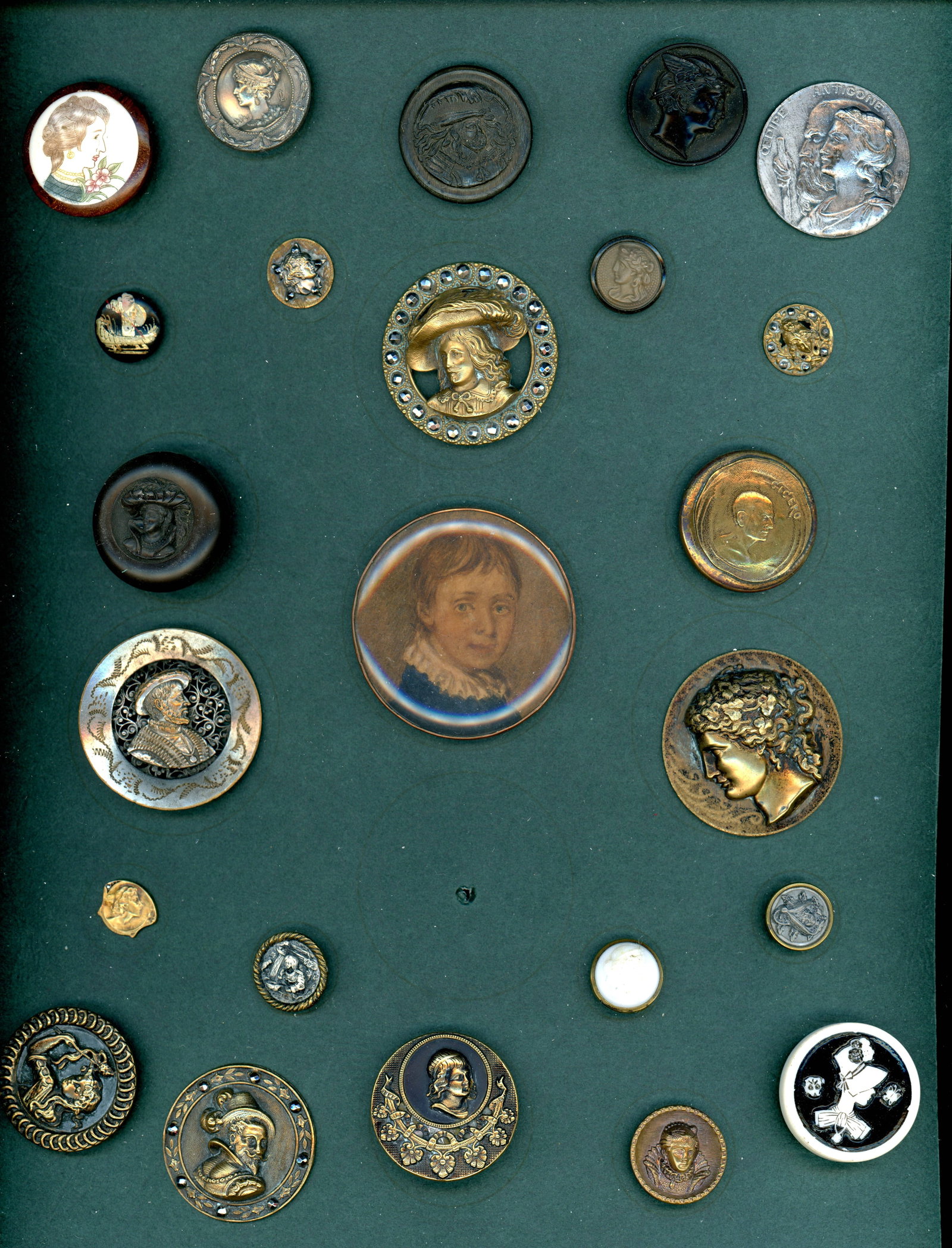 A CARD OF DIVISION ONE AND THREE HEAD BUTTONS: 24 S/M/L 19th/20th century assorted material examples. DimensionsSM=Less than 3/4", Medium=3/4" to 1 1/4". Large=1 1/4" and above, extra large=1 3/4" and above Date or EraDIVISION 1=PRE 1918 AND