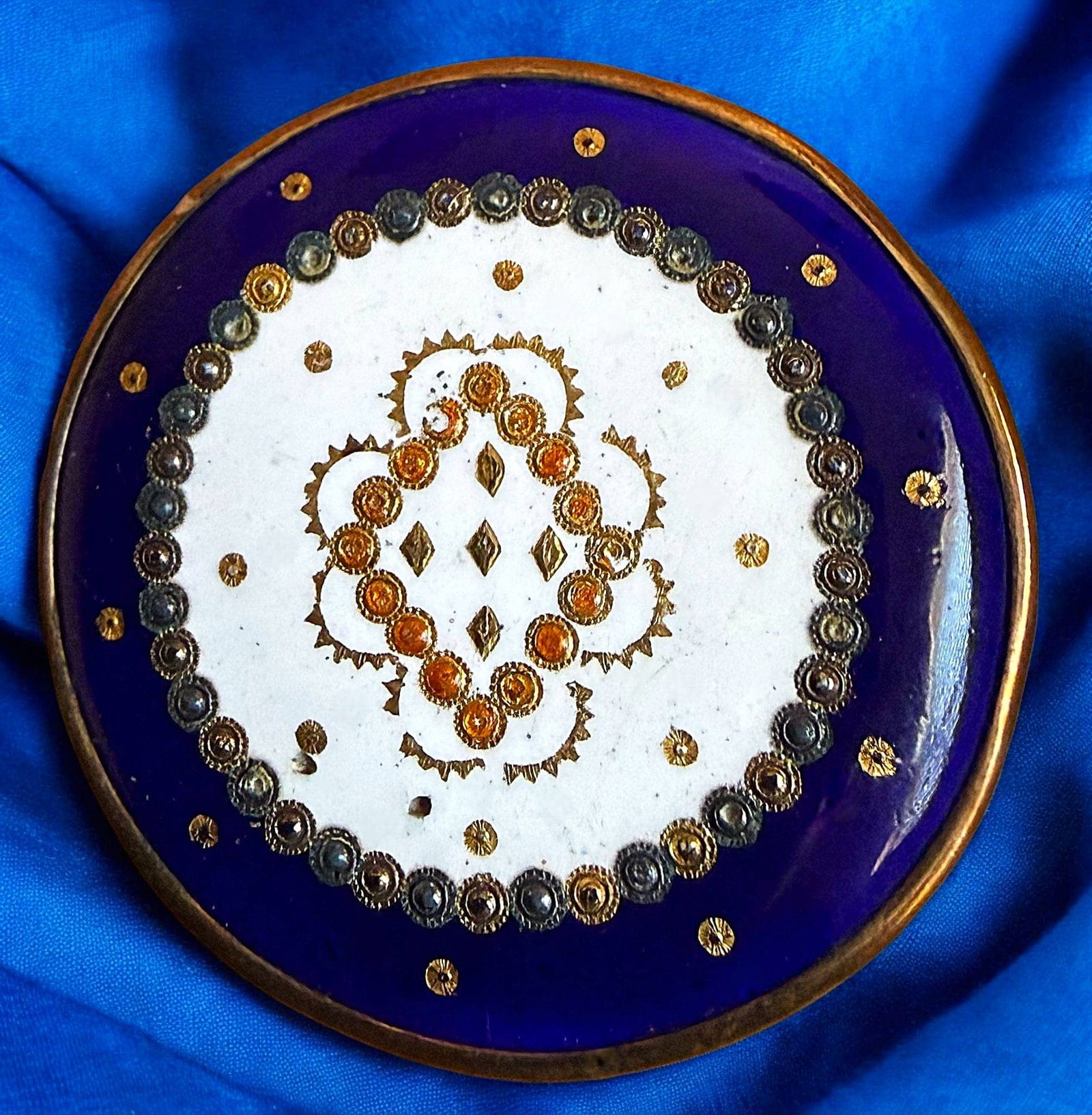 A DIVISION ONE COBALT AND WHITE ENAMEL BUTTON: 1 Large 18th century example with all over gold paillons. DimensionsSM=Less than 3/4", Medium=3/4" to 1 1/4". Large=1 1/4" and above, extra large=1 3/4" and above Date or EraDIVISION 1=PRE 1918 AND DI