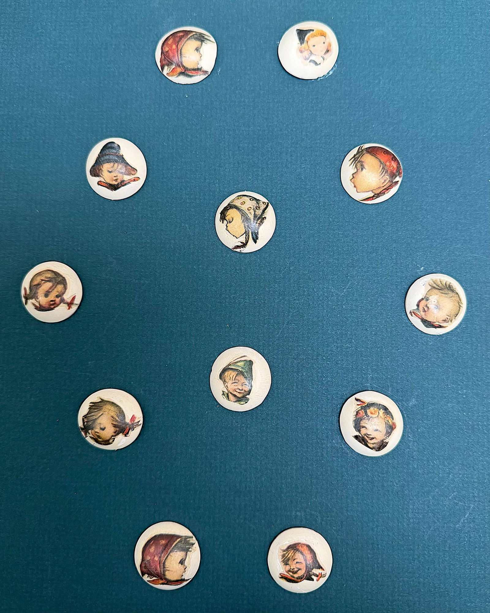 A SET OF DIVISION 3 TRANSFER & COLORED CHILDREN BUTTONS: 12 Medium size 20th century all different buttons of children. DimensionsSM=Less than 3/4", Medium=3/4" to 1 1/4". Large=1 1/4" and above, extra large=1 3/4" and above Date or EraDIVISION 1=PRE 1918 A