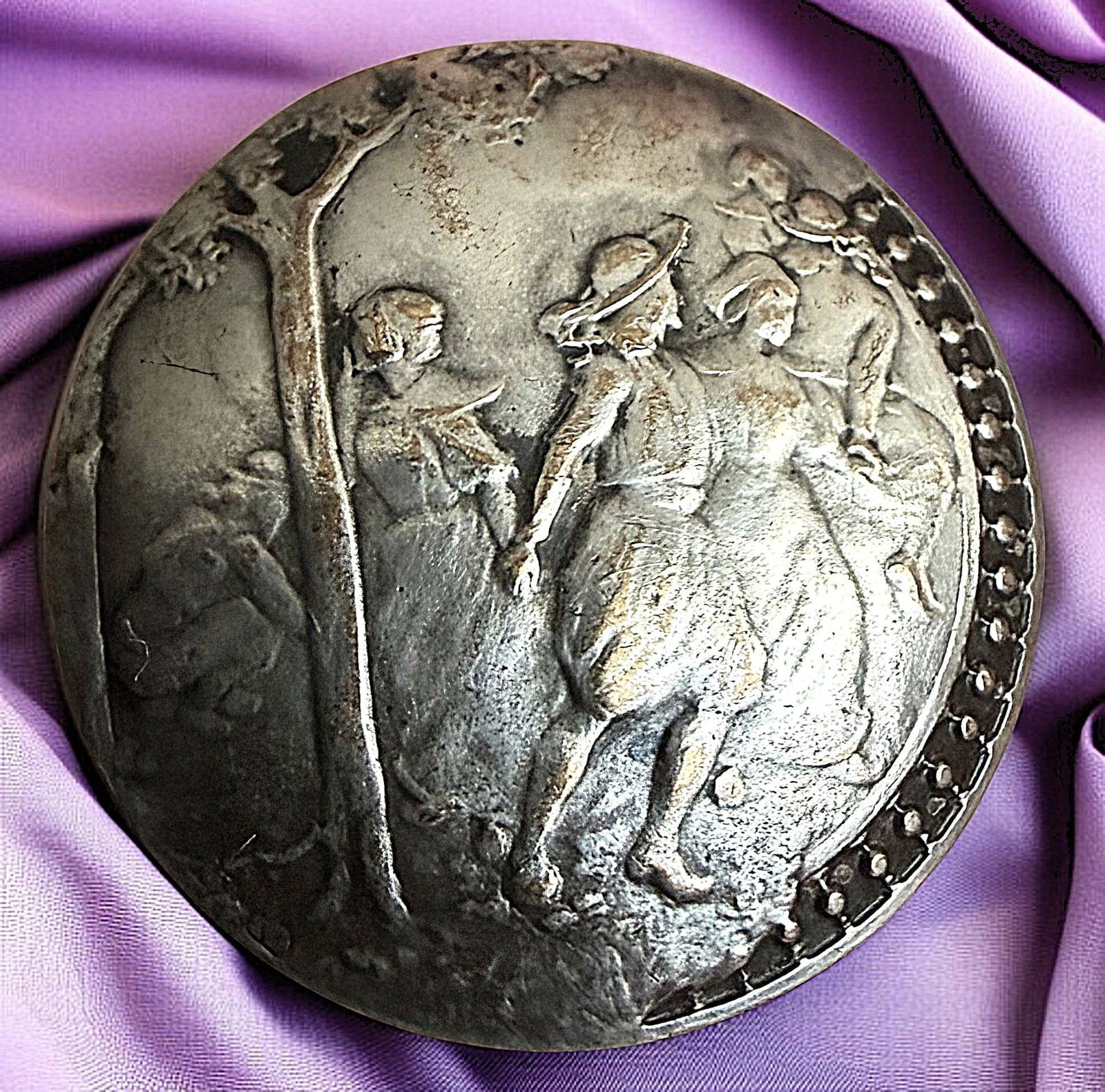 A DIVISION ONE SILVERED BRASS PICTORIAL BUTTON: 1 Large 19th century button depicting young women. DimensionsSM=Less than 3/4", Medium=3/4" to 1 1/4". Large=1 1/4" and above, extra large=1 3/4" and above Date or EraDIVISION 1=PRE 1918 AND DIVISION