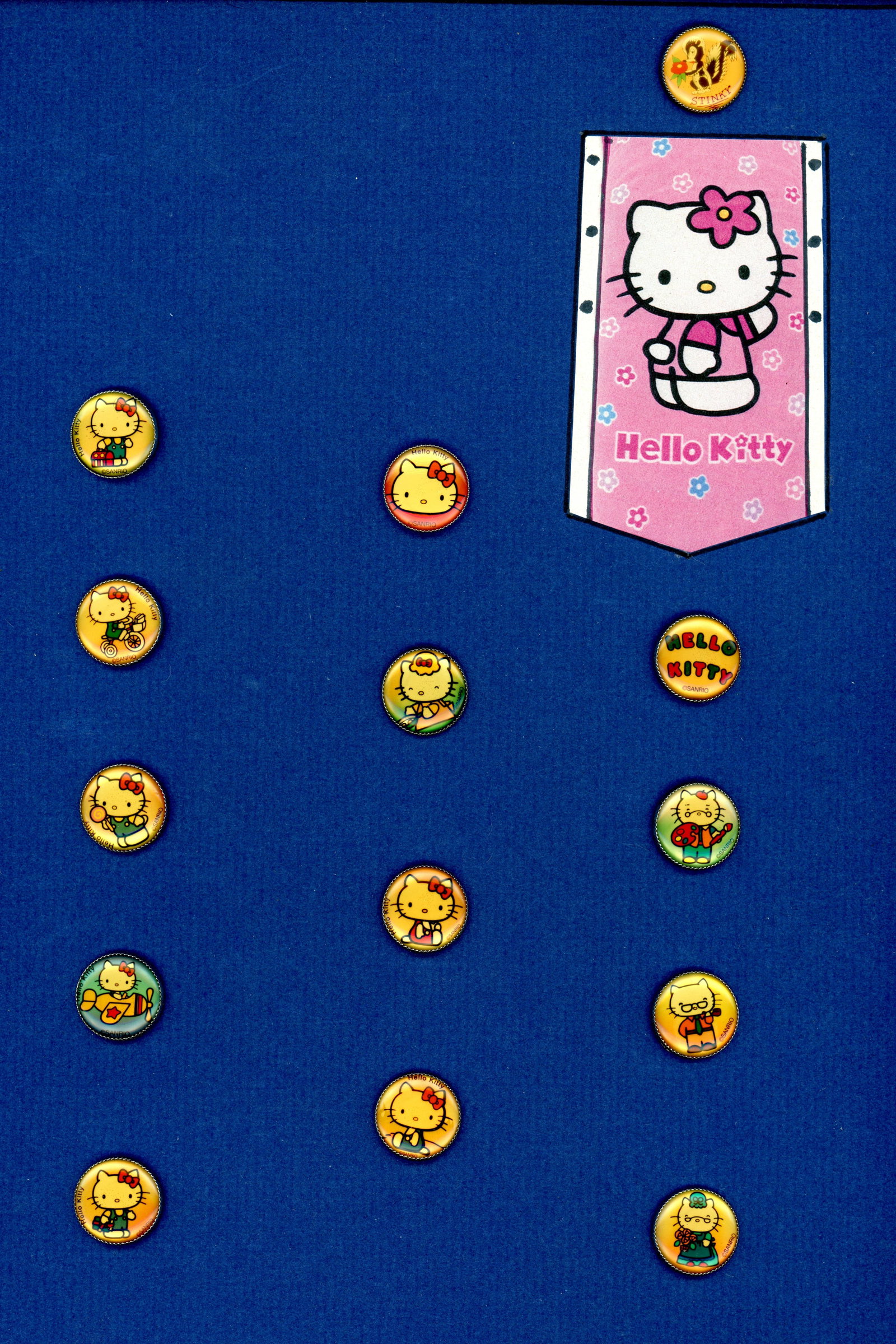 A CARD OF DIVISION THREE CARTOON CHARACTER BUTTONS: 15 Medium 20th century buttons specialized to "Hello Kitty." DimensionsSM=Less than 3/4", Medium=3/4" to 1 1/4". Large=1 1/4" and above, extra large=1 3/4" and above Date or EraDIVISION 1=PRE 1918