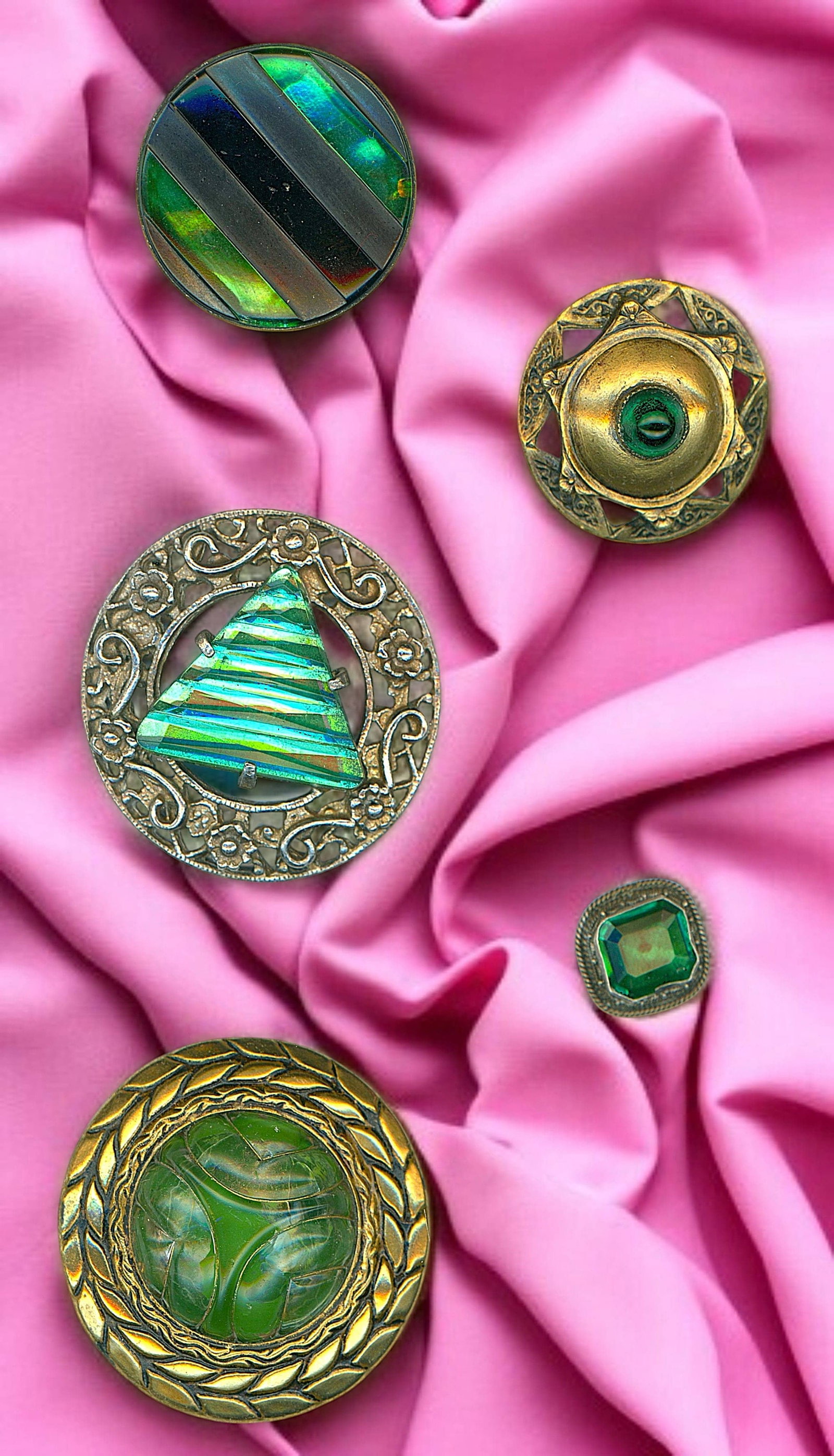 A SMALL CARD OF DIVISION ONE GLASS IN METAL BUTTONS: 5 S/M/L early 20th century green glass in metal examples. Do you like glass in metal? Do you like the color Green? Do you like buttons?, if you answered yes to each of these, then you ought to bid on