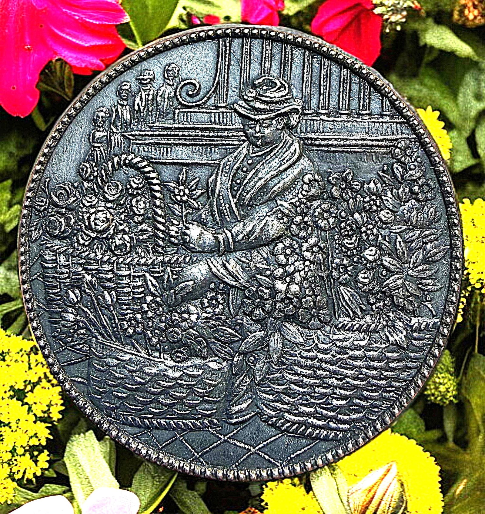 A DIVISION THREE DETAILED PICTURE BUTTON: 1 Extra Large early 20th C. button called "The Flower Vendor" DimensionsSM=Less than 3/4", Medium=3/4" to 1 1/4". Large=1 1/4" and above, extra large=1 3/4" and above Date or EraDIVISION 1=PRE 1918 AN
