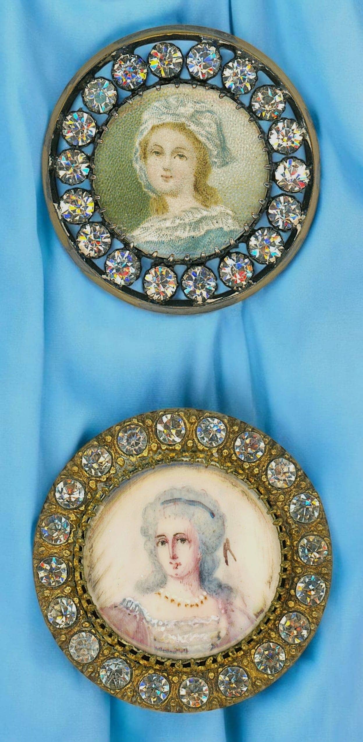 A SMALL CARD OF DIVISION ONE FEMALE BUTTONS: 2 Large/Lg. Med. 19th C. hand painted & litho under glass examples. DimensionsSM=Less than 3/4", Medium=3/4" to 1 1/4". Large=1 1/4" and above, extra large=1 3/4" and above Date or EraDIVISION 1=PRE 1