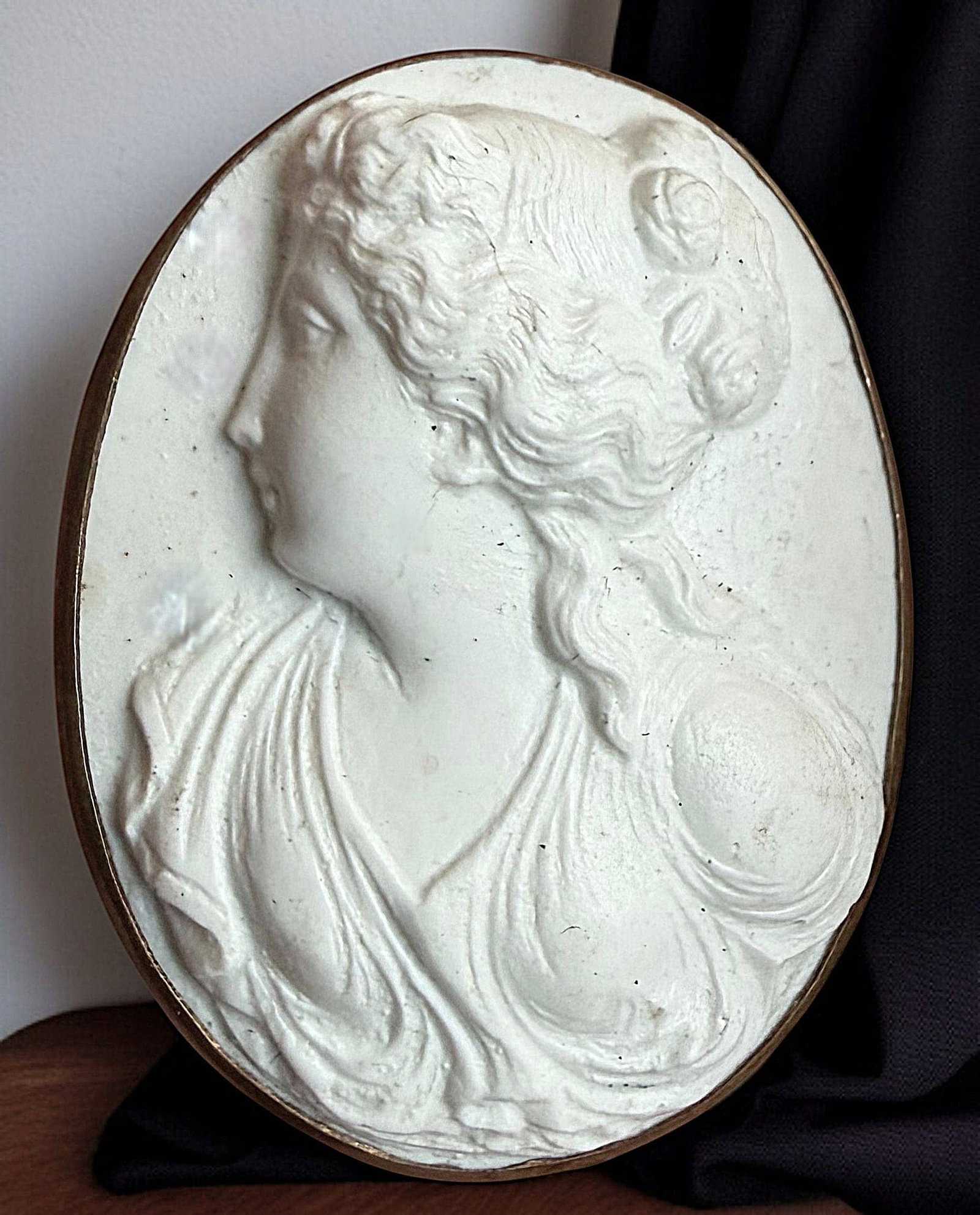 A HARD TO FIND DIVISION ONE CARVED LAVA BUTTON: 1 Large late 19th century high relief ladies head in metal. DimensionsSM=Less than 3/4", Medium=3/4" to 1 1/4". Large=1 1/4" and above, extra large=1 3/4" and above Date or EraDIVISION 1=PRE 1918 AND
