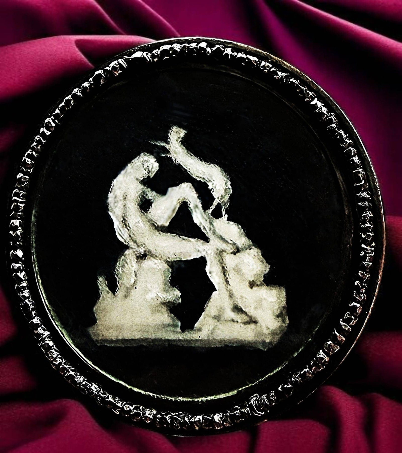 A SCARCE DIVISION ONE HAND PAINTED UNDER GLASS BUTTON: 1 Large 18th century En Grisaille example of erotica. What makes this button scarce is the depiction as well as the steel beaded border. The steel beads are sewn together around the border highlightin