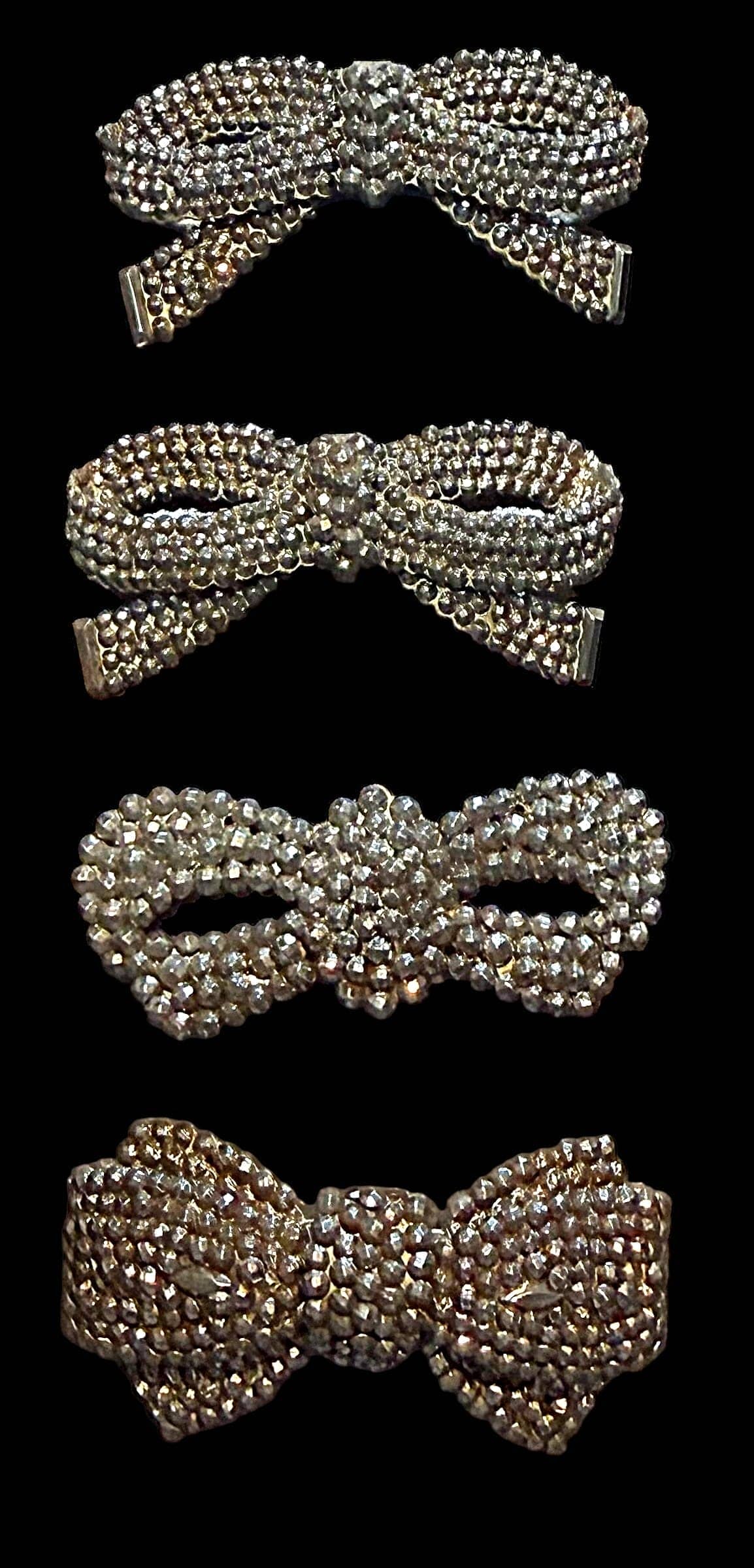 A SMALL SELECTION OF DIVISION 3 SHOE CLIPS: 4 Large 19th C. NBS Division 4 Cut Steel examples in BOW shape. DimensionsSM=Less than 3/4", Medium=3/4" to 1 1/4". Large=1 1/4" and above, extra large=1 3/4" and above Date or EraDIVISION 1=PRE 1918