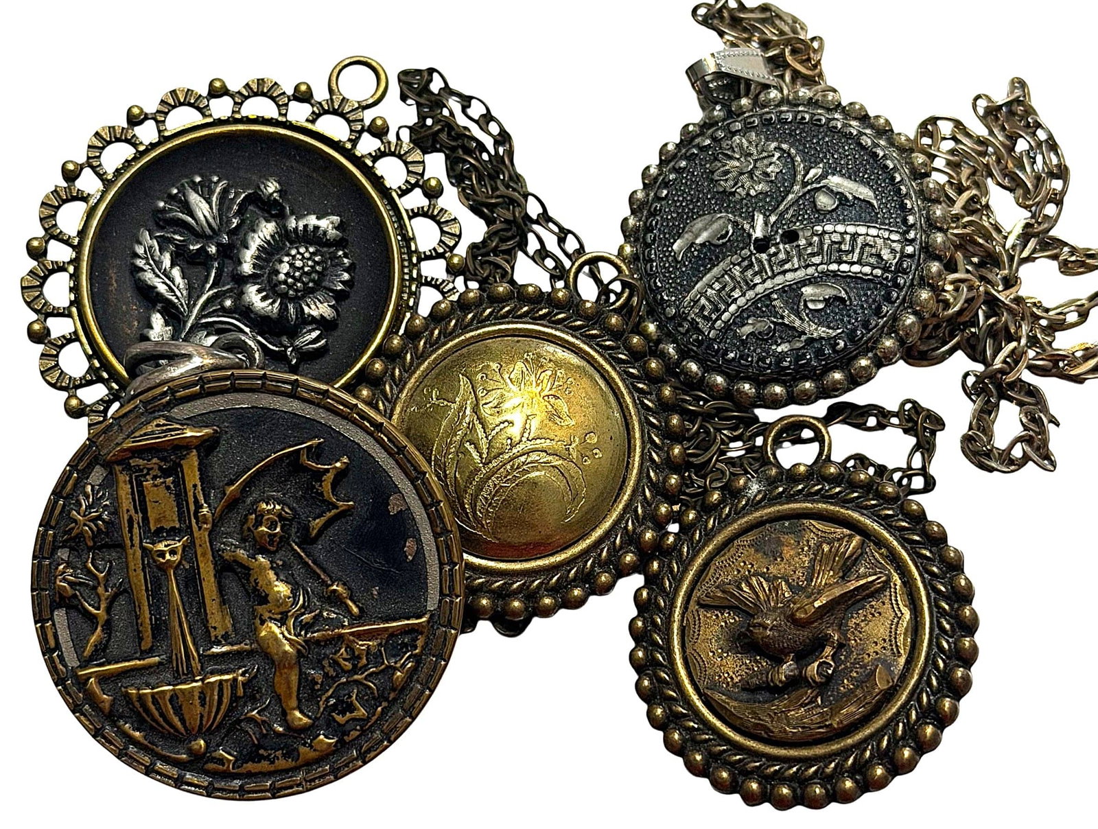 A SELECTION OF BUTTON JEWLRY: 5 necklaces with 19th century buttons. DimensionsSM=Less than 3/4", Medium=3/4" to 1 1/4". Large=1 1/4" and above, extra large=1 3/4" and above Date or EraDIVISION 1=PRE 1918 AND DIVISION 3 IS AFTER