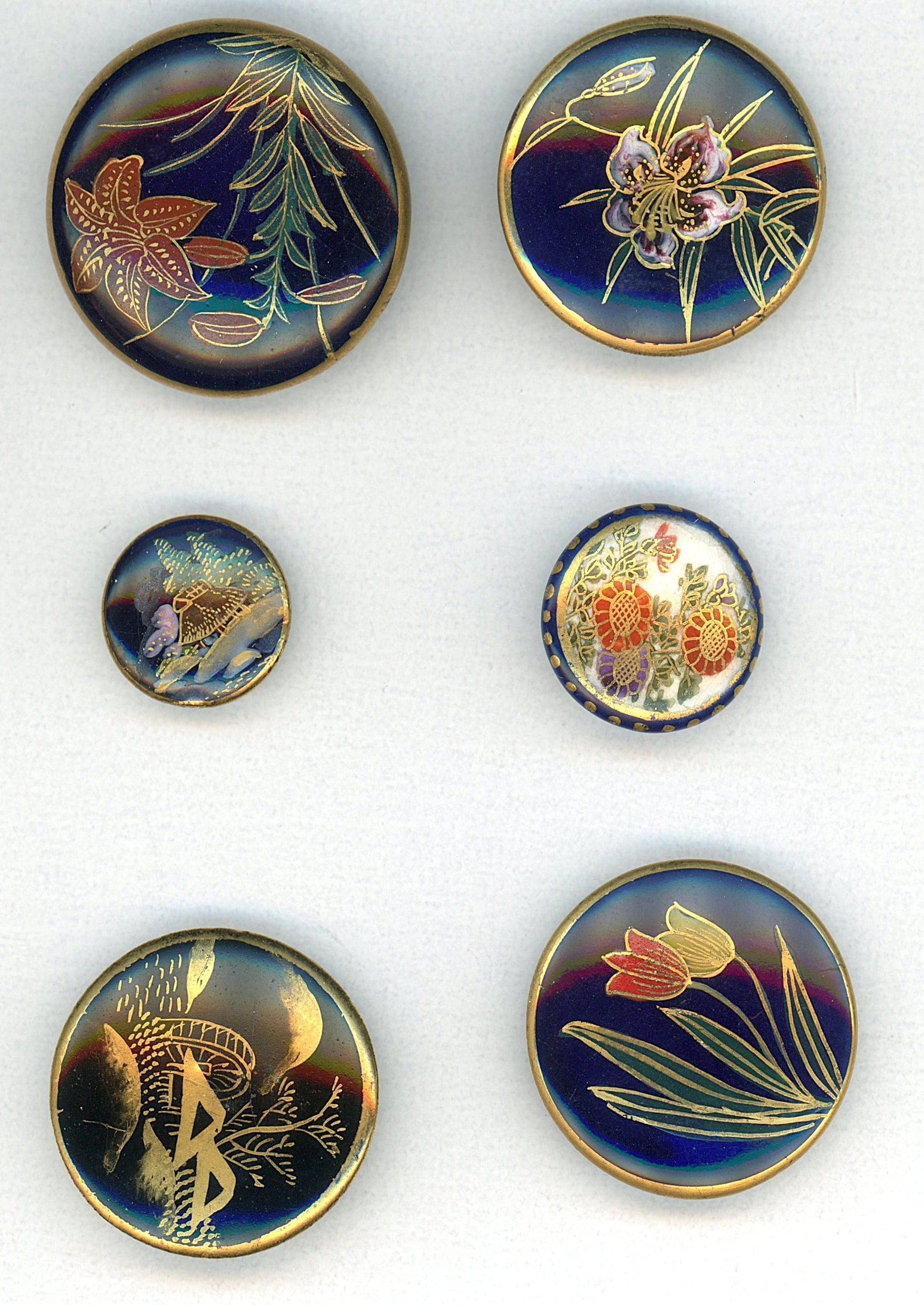 A SMALL CARD OF DIVISION ONE AND THREE SATSUMA BUTTONS: 6 Small/Medium 19th/20th Examples specialized to cobalt blue. Each example on this small card has a cobalt blue base and all date to the late 1800's into the 1930's. A nice small selection.