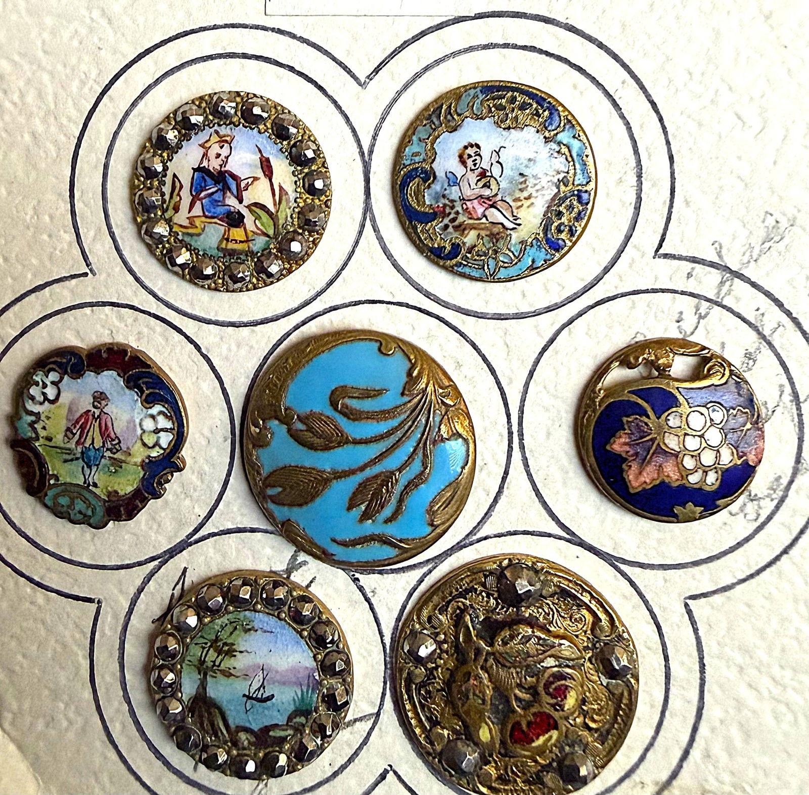 A SMALL CARD OF DIVISI0N ONE ENAMEL BUTTONS: 7 Small 19th century pictorial examples. DimensionsSM=Less than 3/4", Medium=3/4" to 1 1/4". Large=1 1/4" and above, extra large=1 3/4" and above Date or EraDIVISION 1=PRE 1918 AND DIVISION 3 IS AFTER