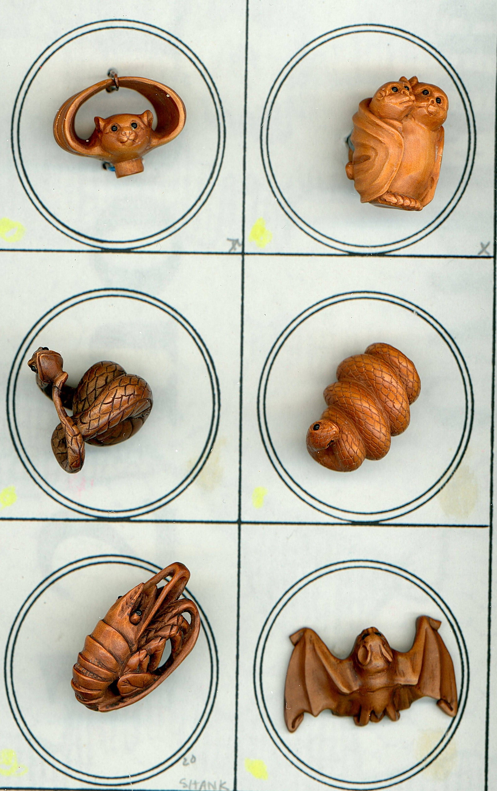 A SMALL SELECTION OF DIV. 3 REALISTIC ANIMAL BUTTONS: 6 Medium/Large 21st century assorted Boxwood examples. These carved Boxwood buttons were imported from China in the early 2000's and Pauline Lum of California sure loved them as she purchased many of